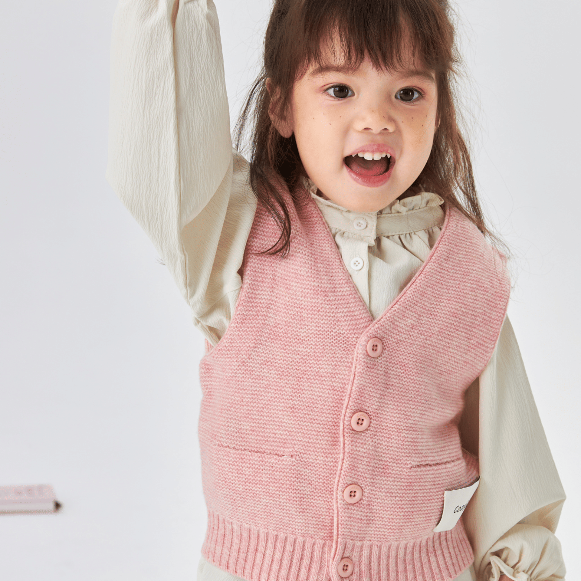 Merino V-Neck Knit Vest | Blossom Pink made by CozyU