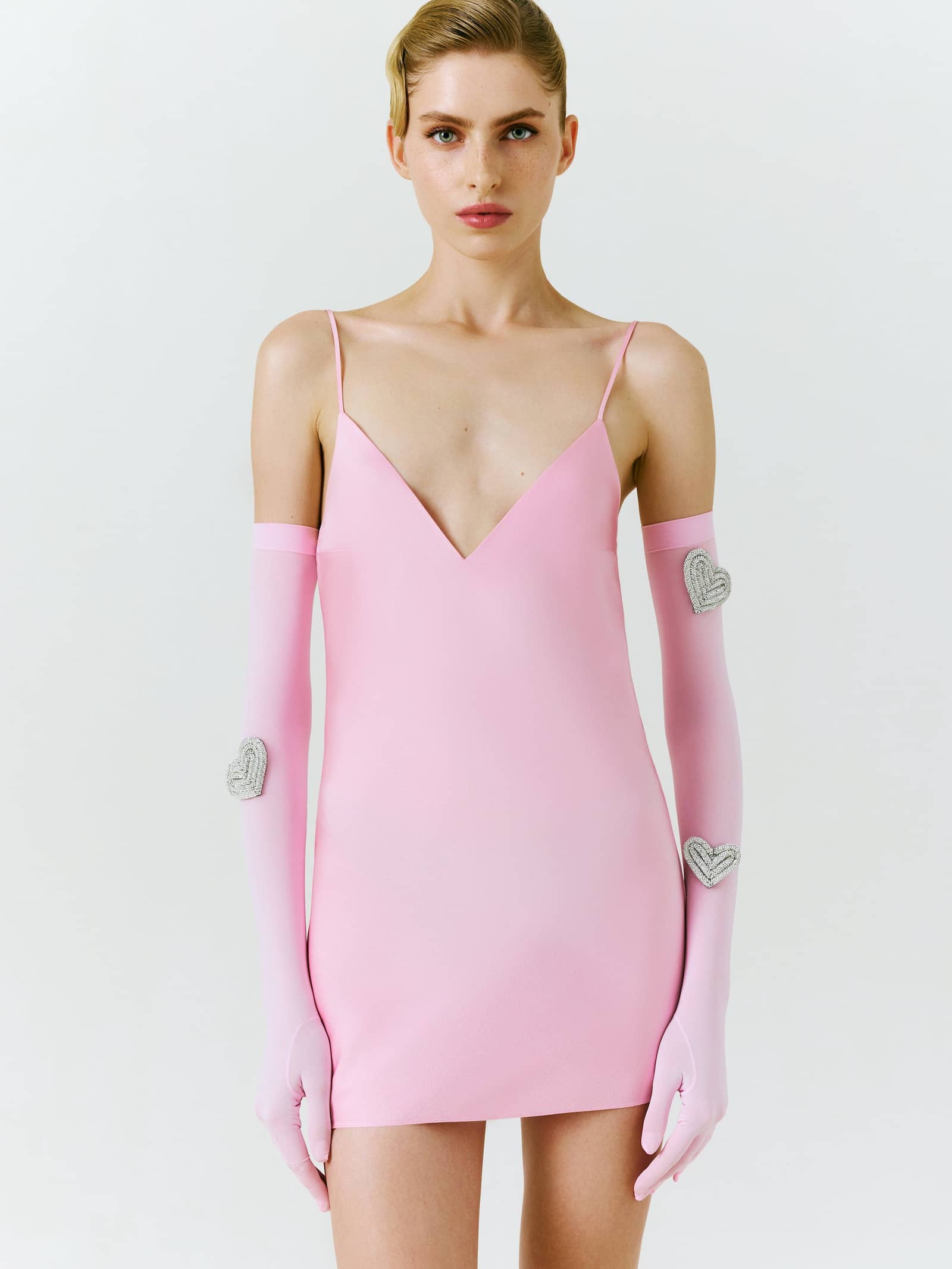 Heart-embellished opera-length gloves in Pink made by NDS The Label
