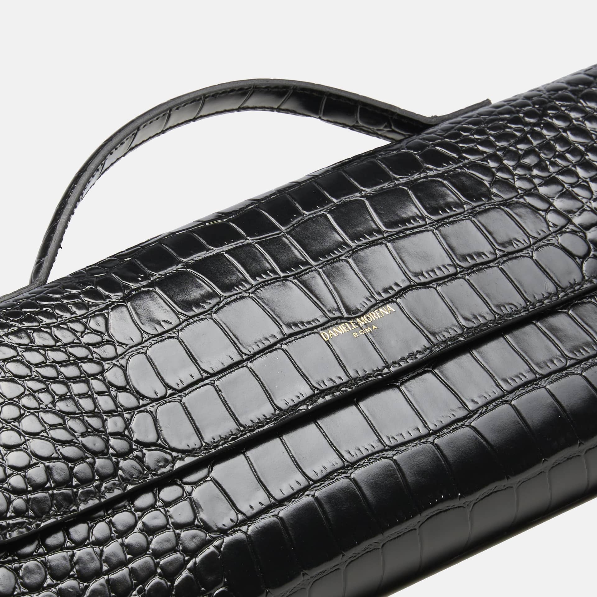 BÉA CLUTCH BAG In Black Snakeskin made by Daniele Morena