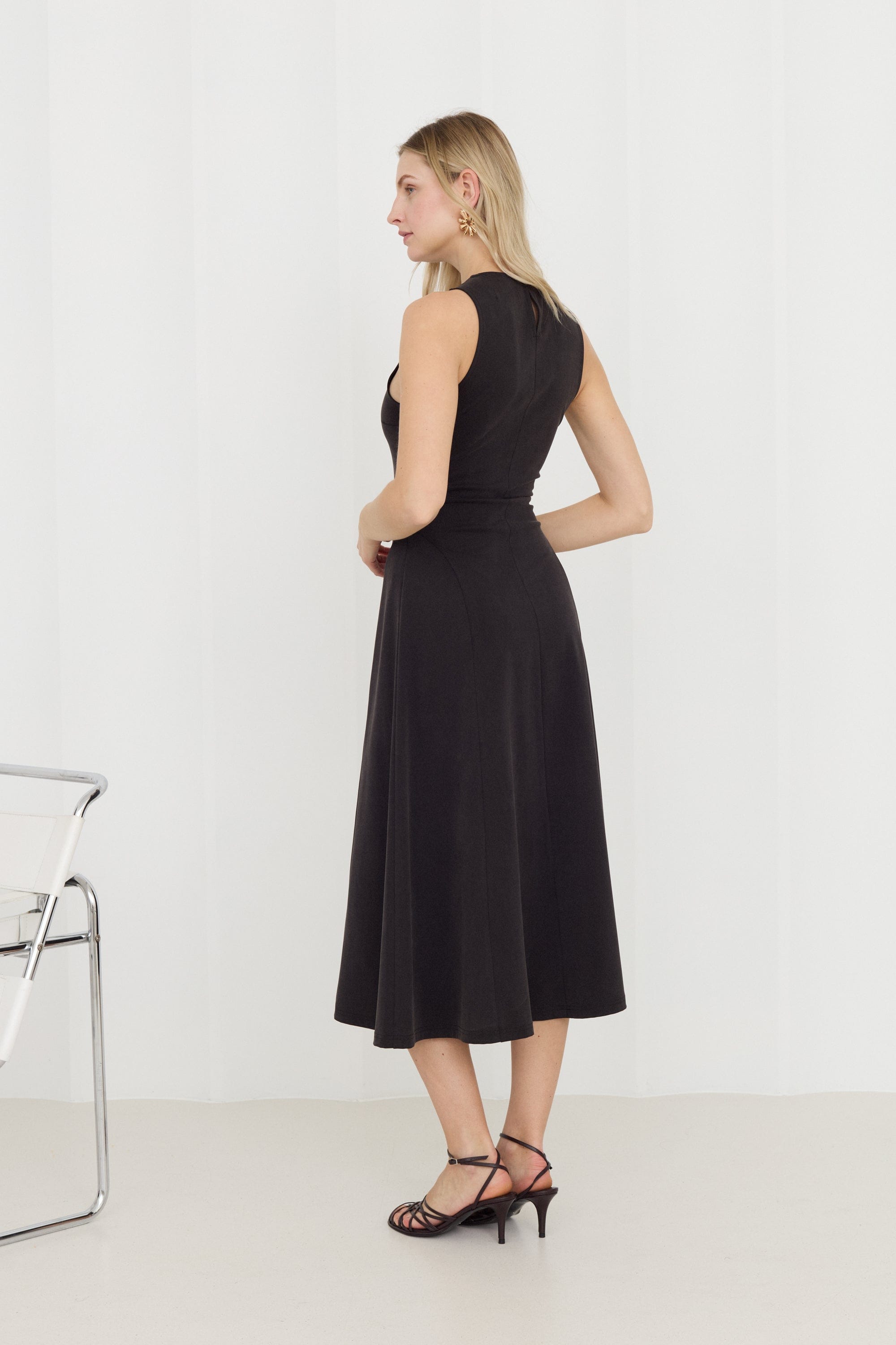 SEBA Black Bodycon Midi Dress With Flared Skirt made by UNDRESS