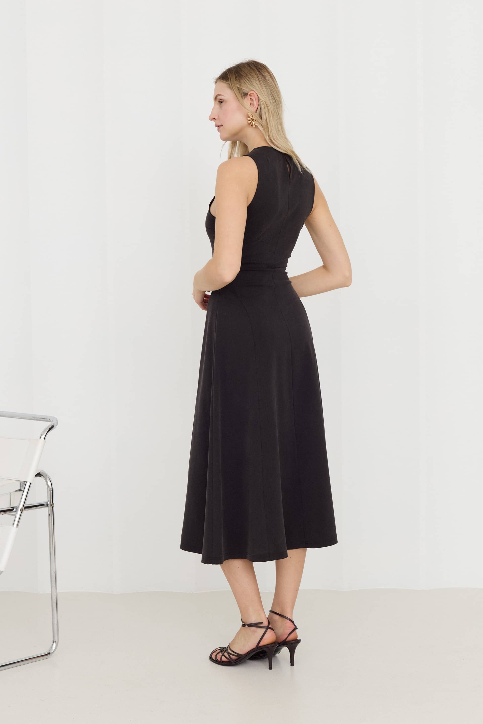 SEBA Black Bodycon Midi Dress With Flared Skirt made by UNDRESS