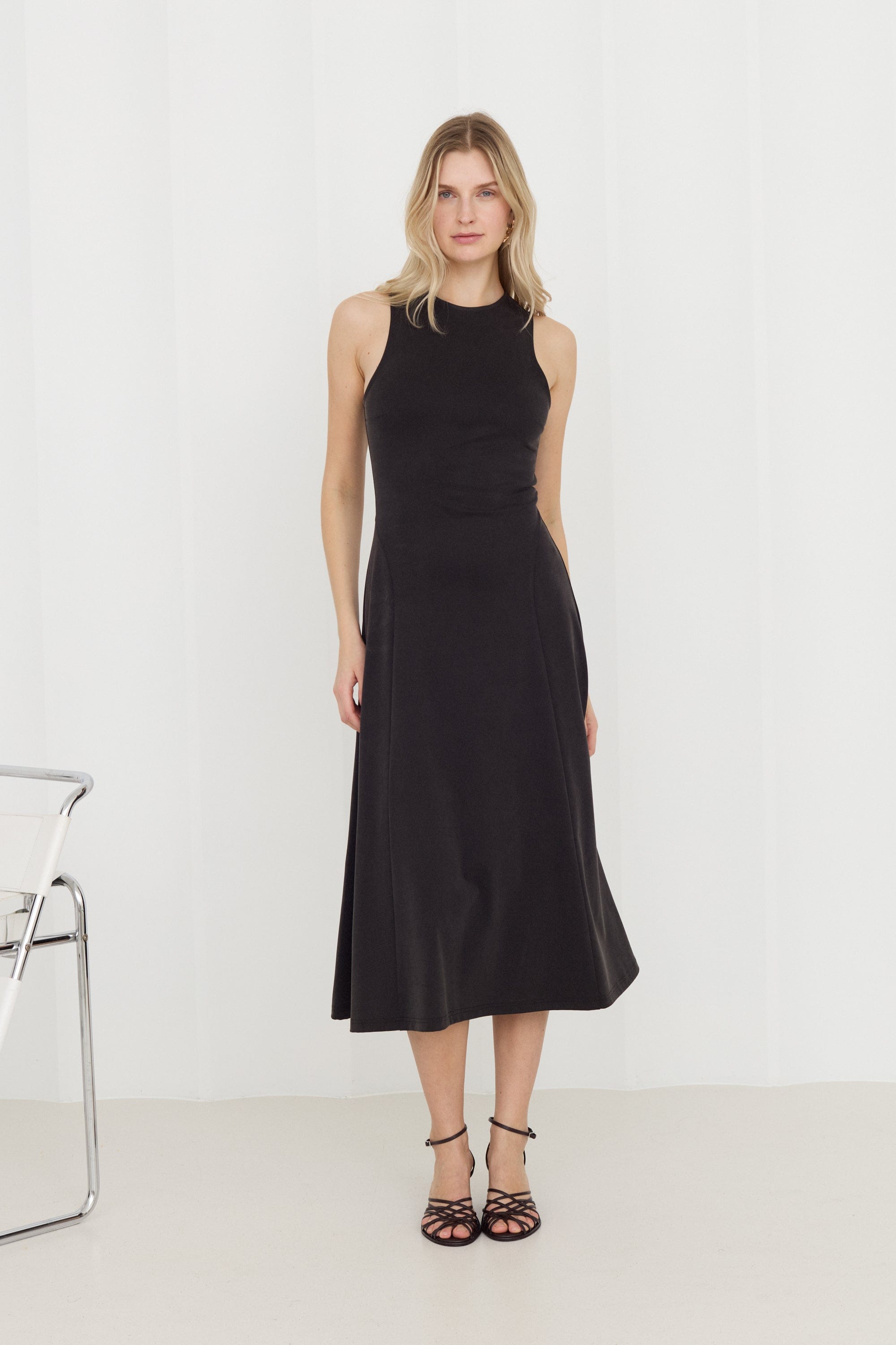 SEBA Black Bodycon Midi Dress With Flared Skirt made by UNDRESS