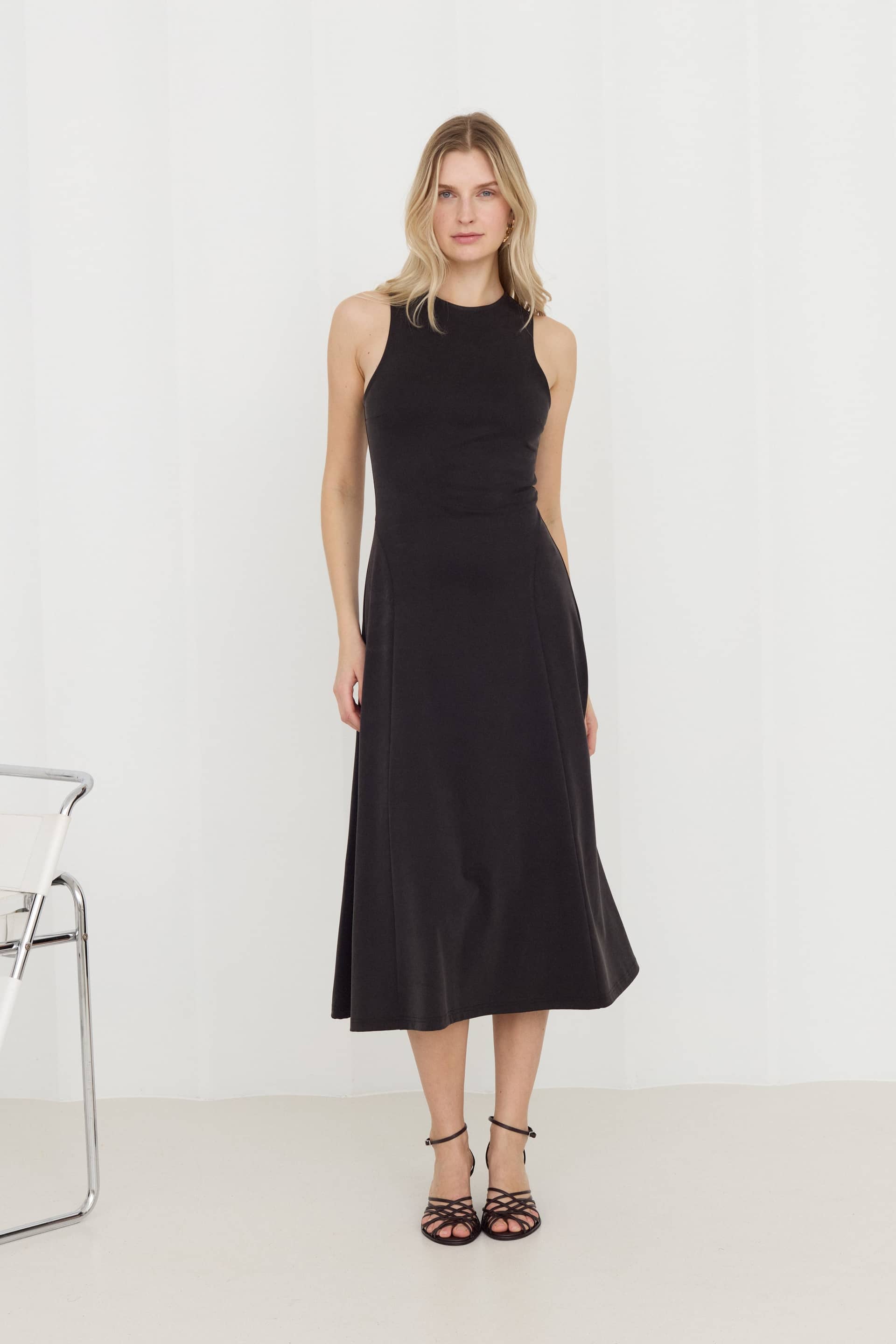 SEBA Black Bodycon Midi Dress With Flared Skirt made by UNDRESS