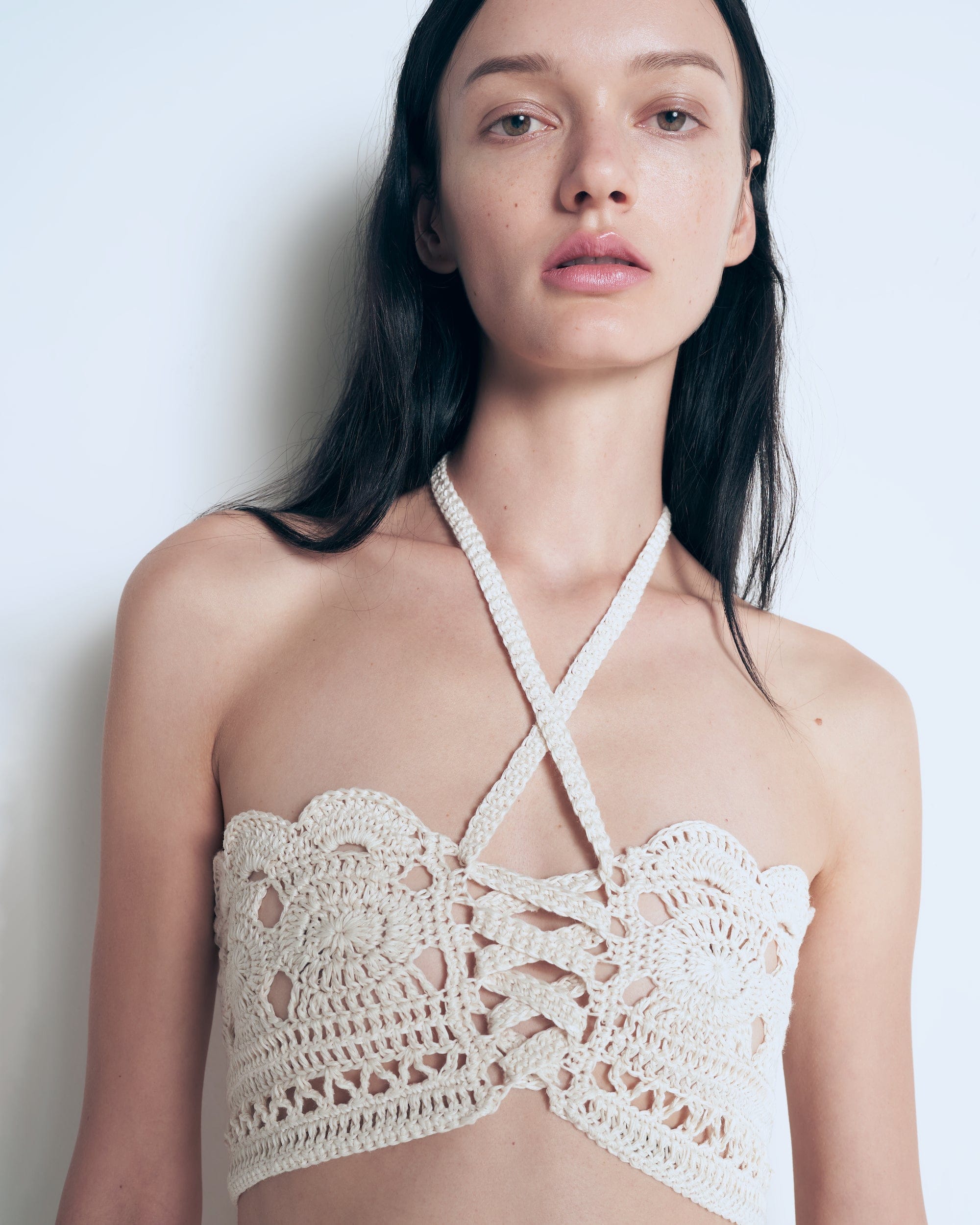 Knitted white top made by A.M.G