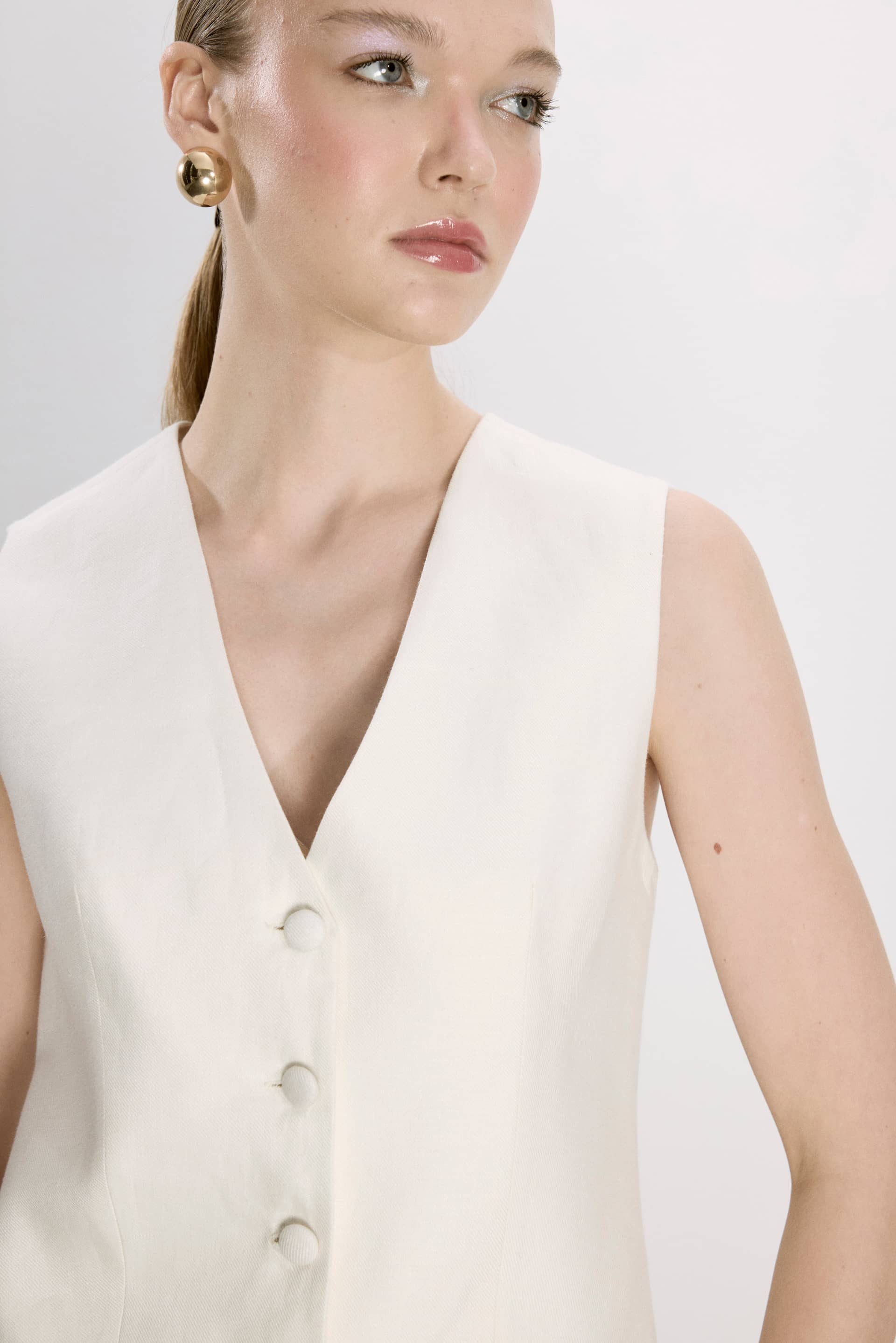 Brita Linen Vest In White made by Nazli Ceren