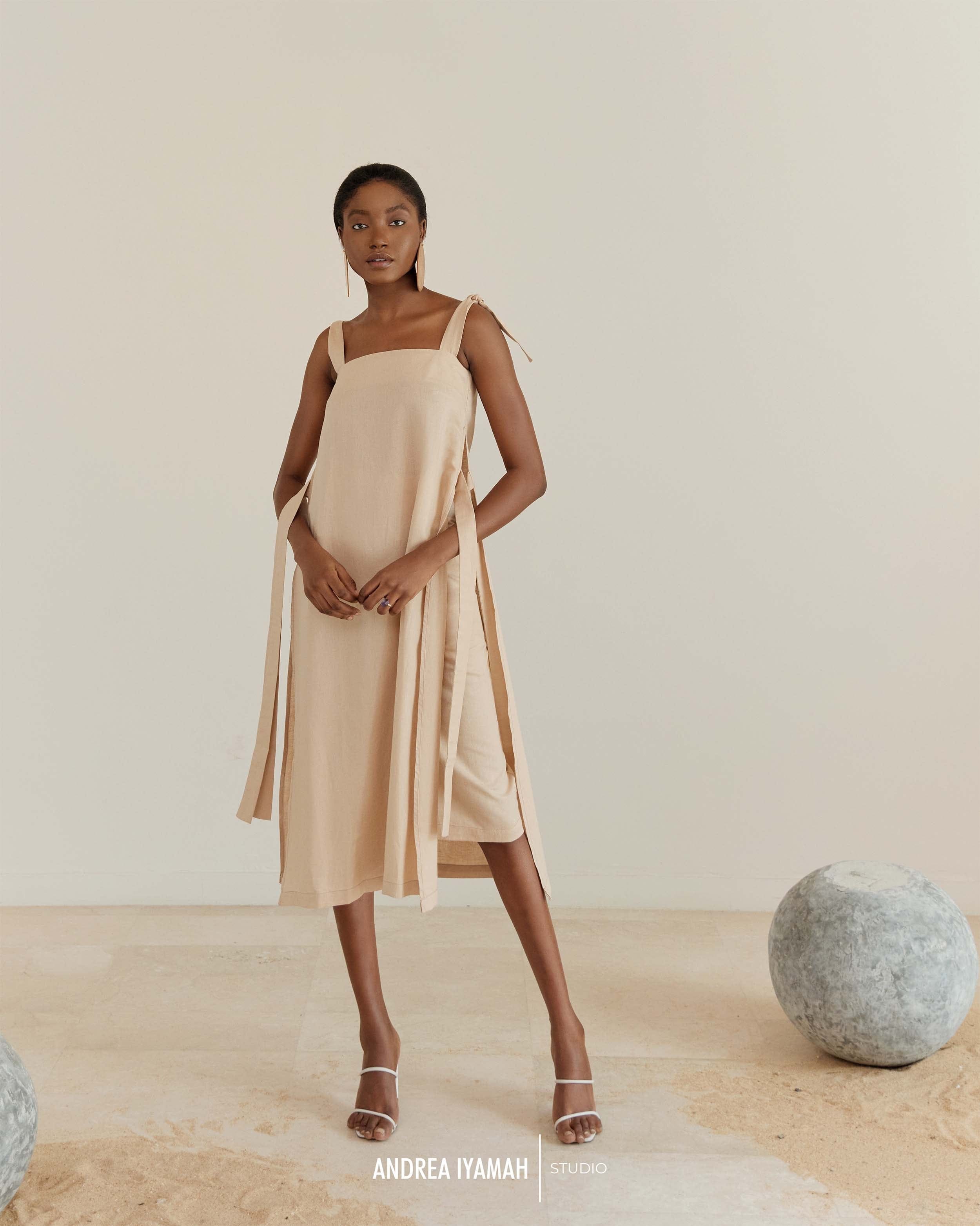 AFO CREAM MIDI SKIRT made by Andrea Iyamah