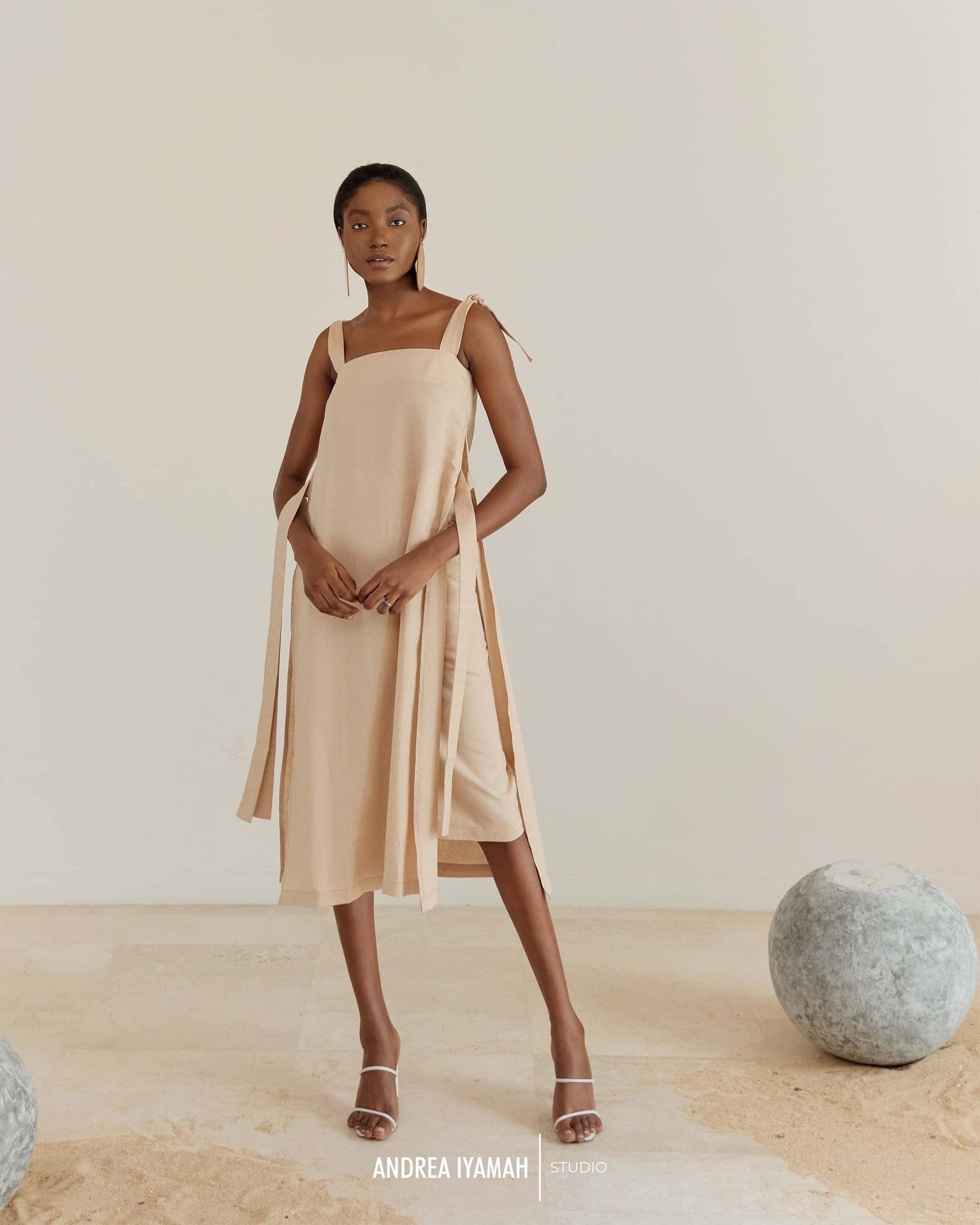 AFO CREAM MIDI SKIRT made by Andrea Iyamah