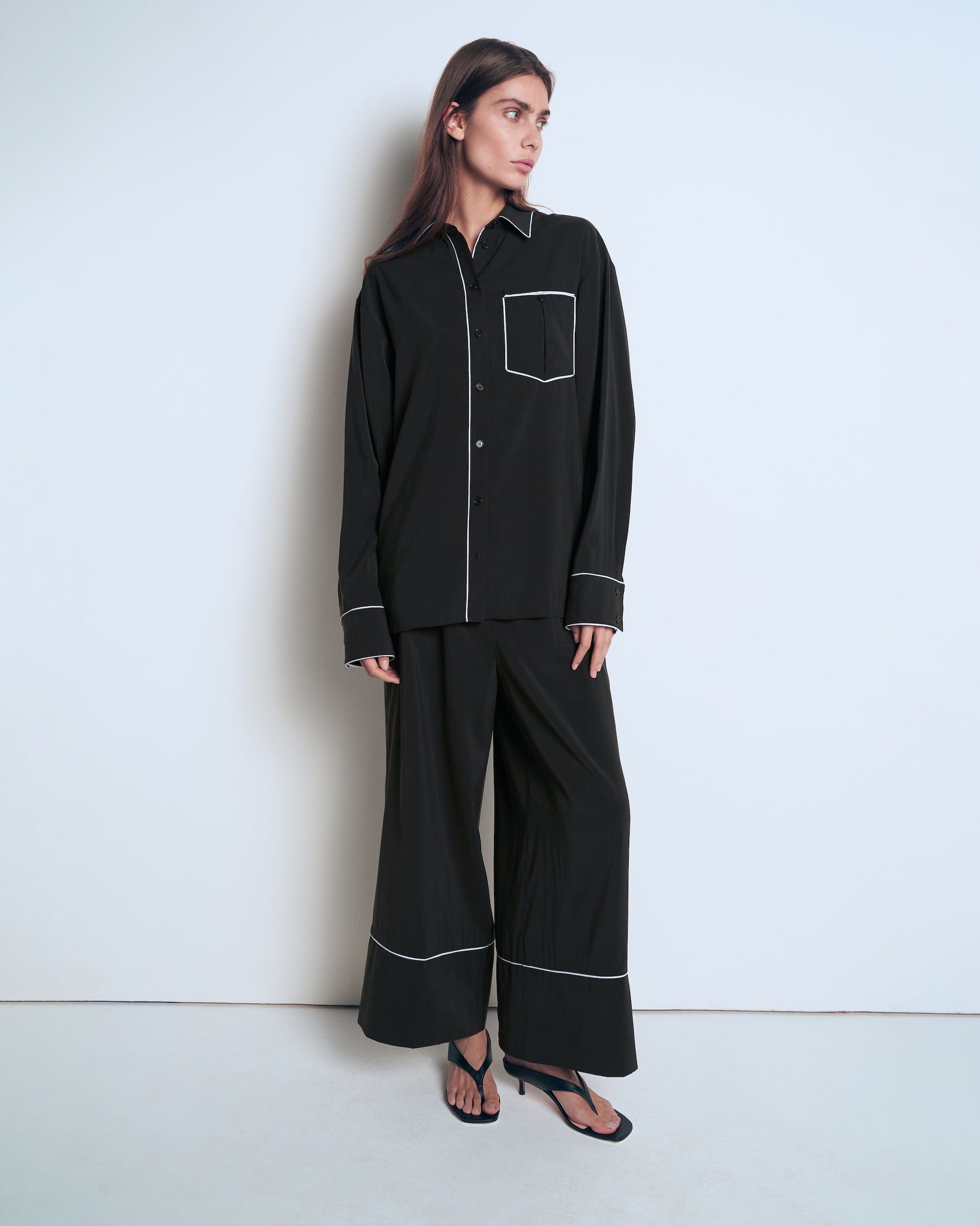 Pajama trousers with white piping made by A.M.G