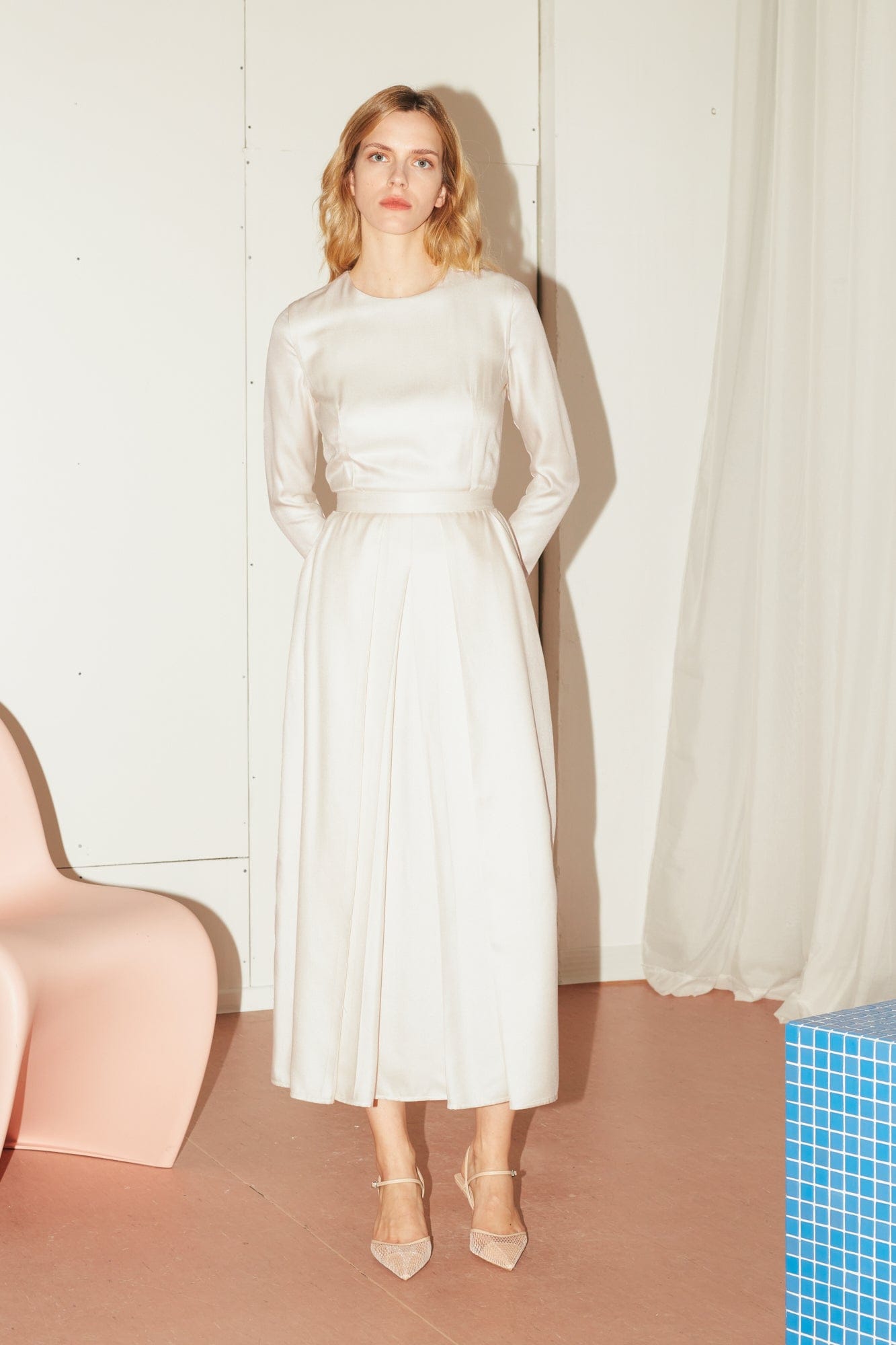 TILDA pastel cream classic pleated midi dress in White made by UNDRESS