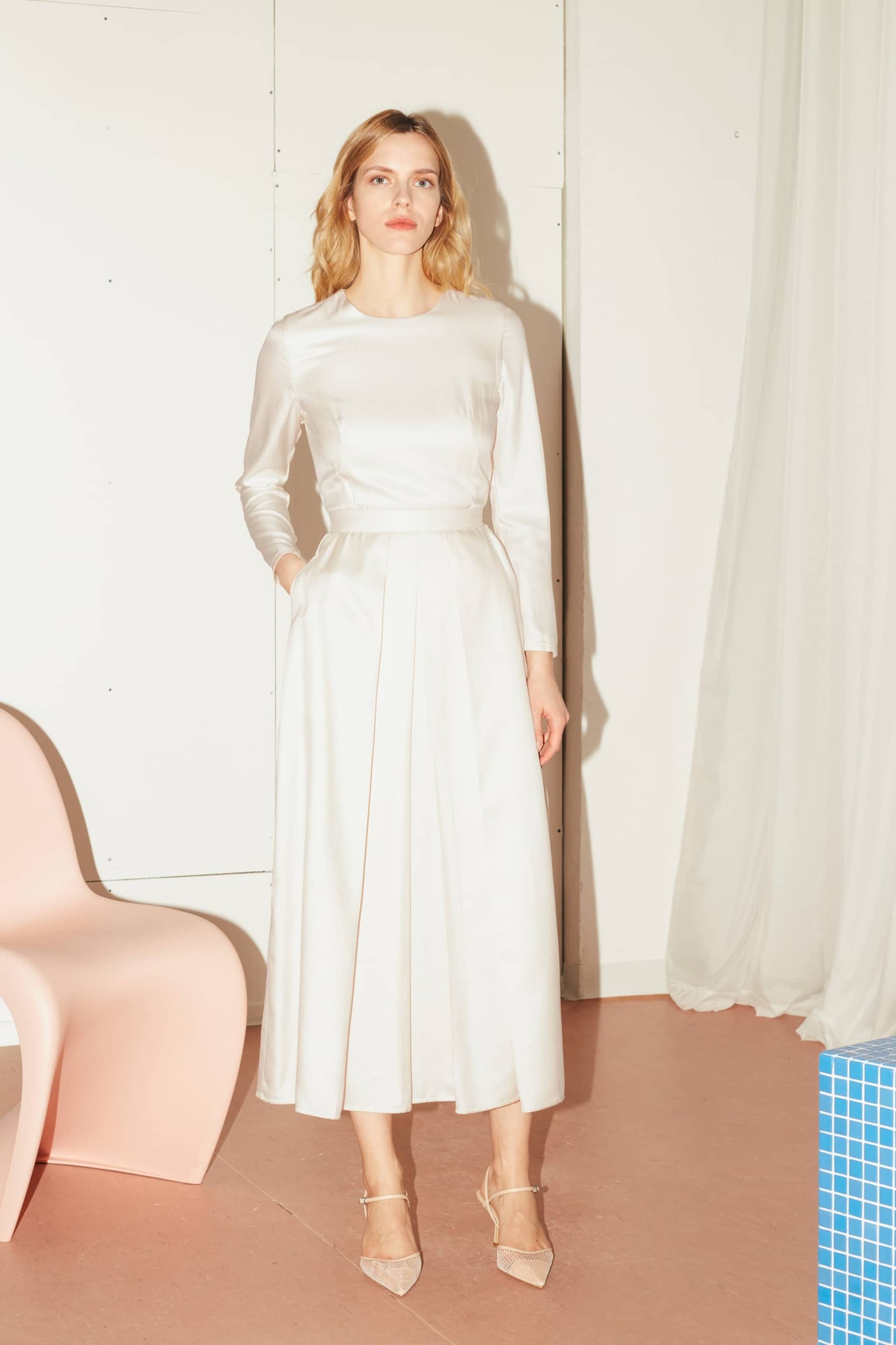 TILDA pastel cream classic pleated midi dress in White made by UNDRESS