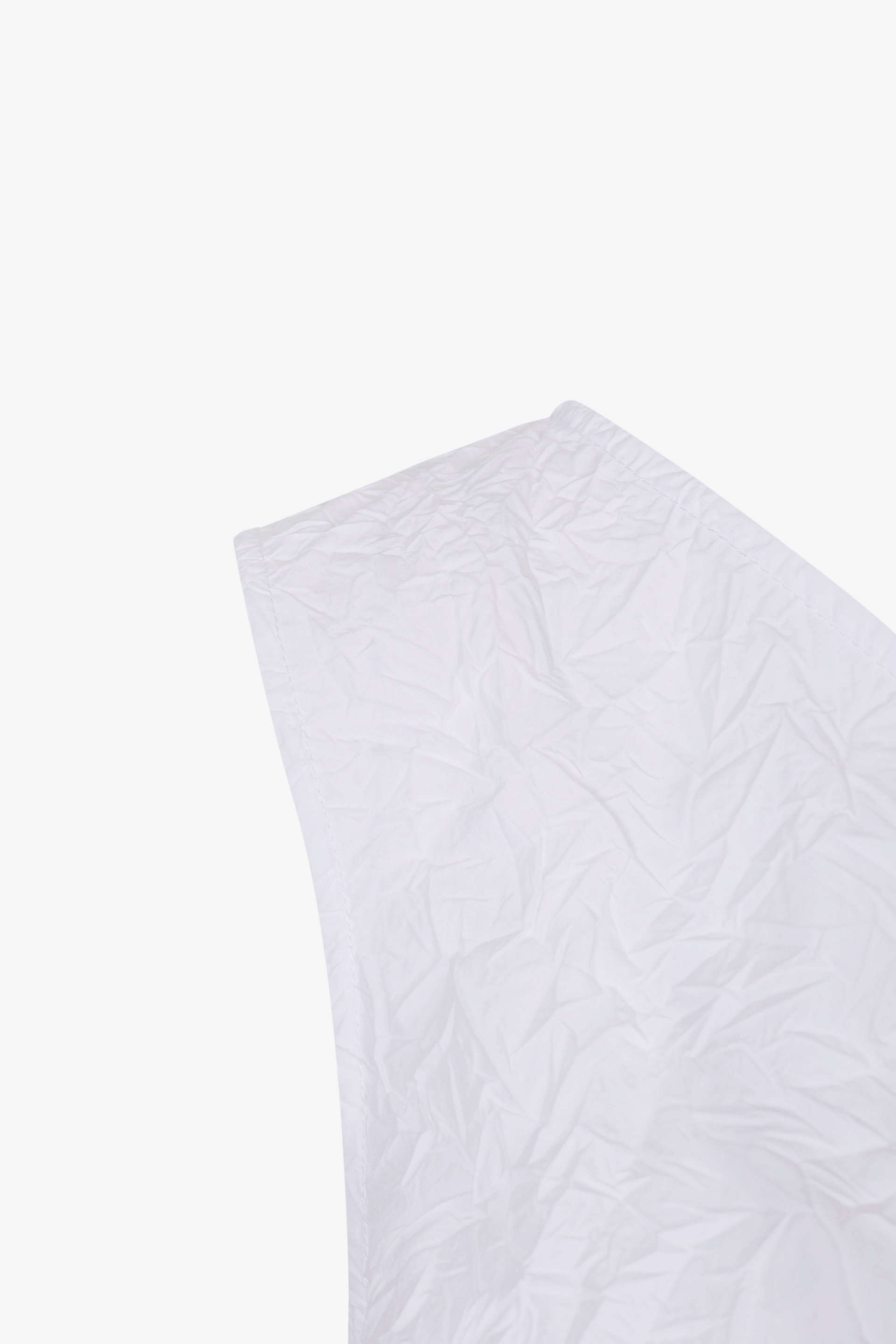 WHITE TEXTURED DRAPED MINI DRES made by YIBRI