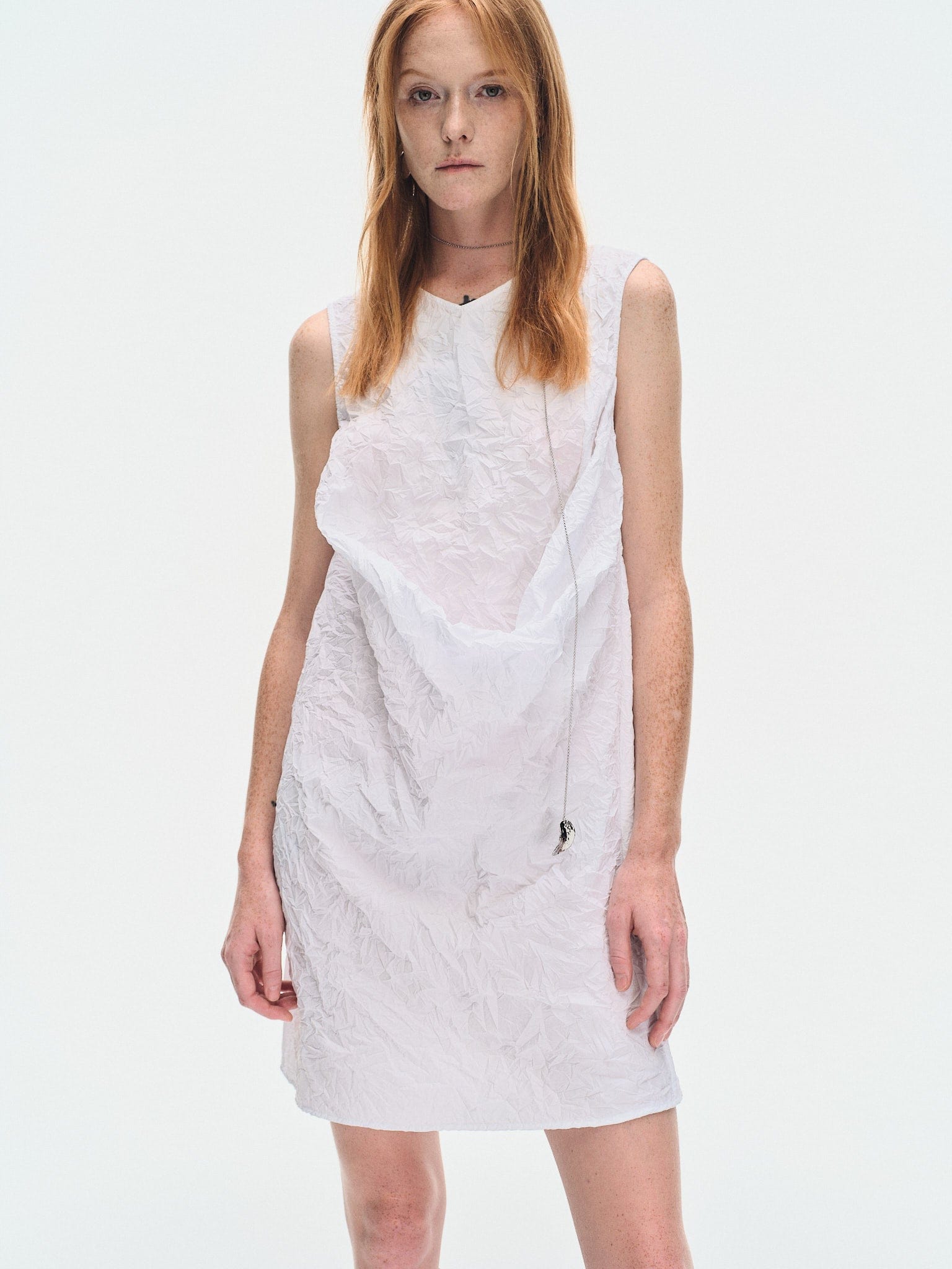 WHITE TEXTURED DRAPED MINI DRES made by YIBRI