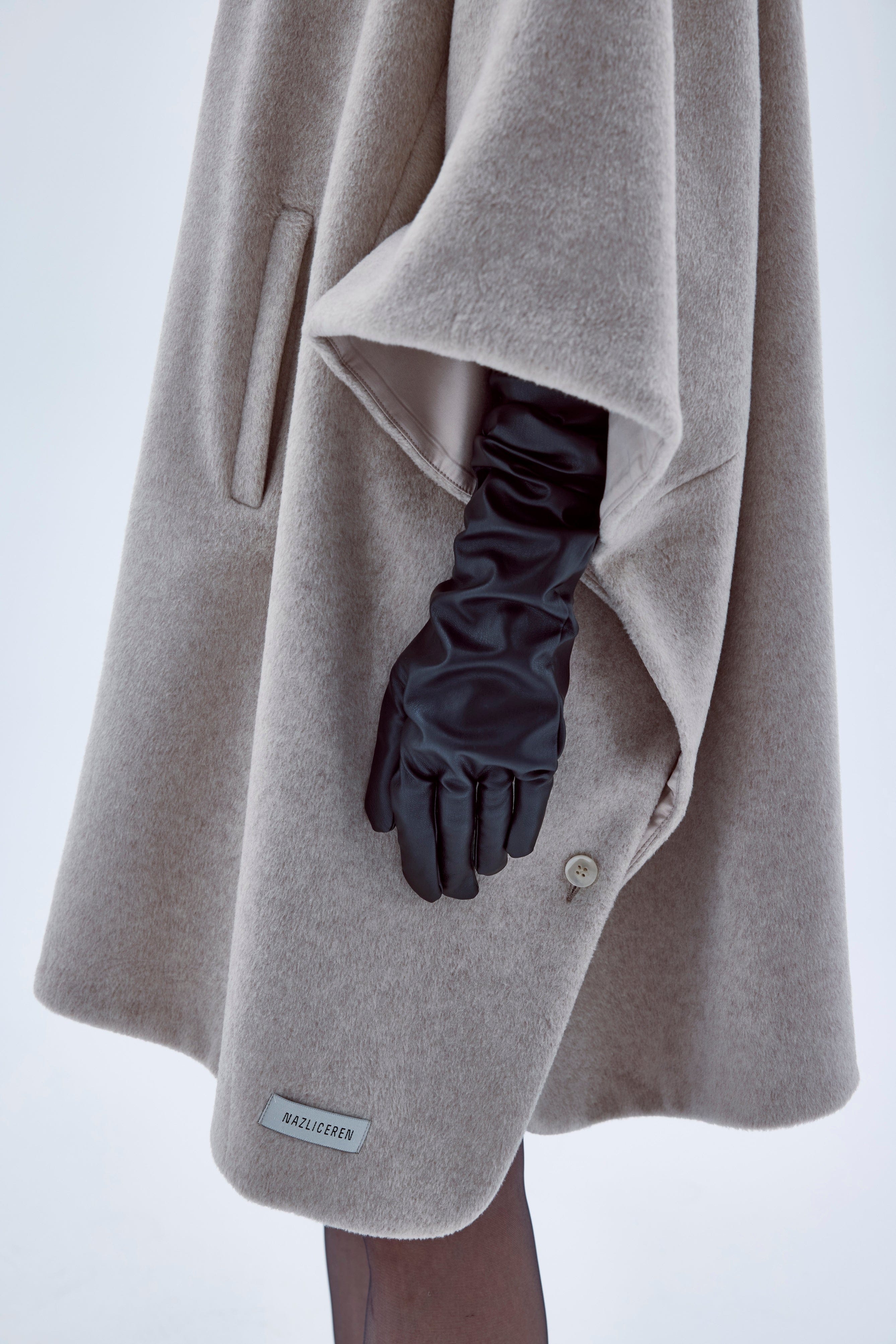 JARINE WOOL BLEND PONCHO IN LIGHT BEIGE made by Nazli Ceren