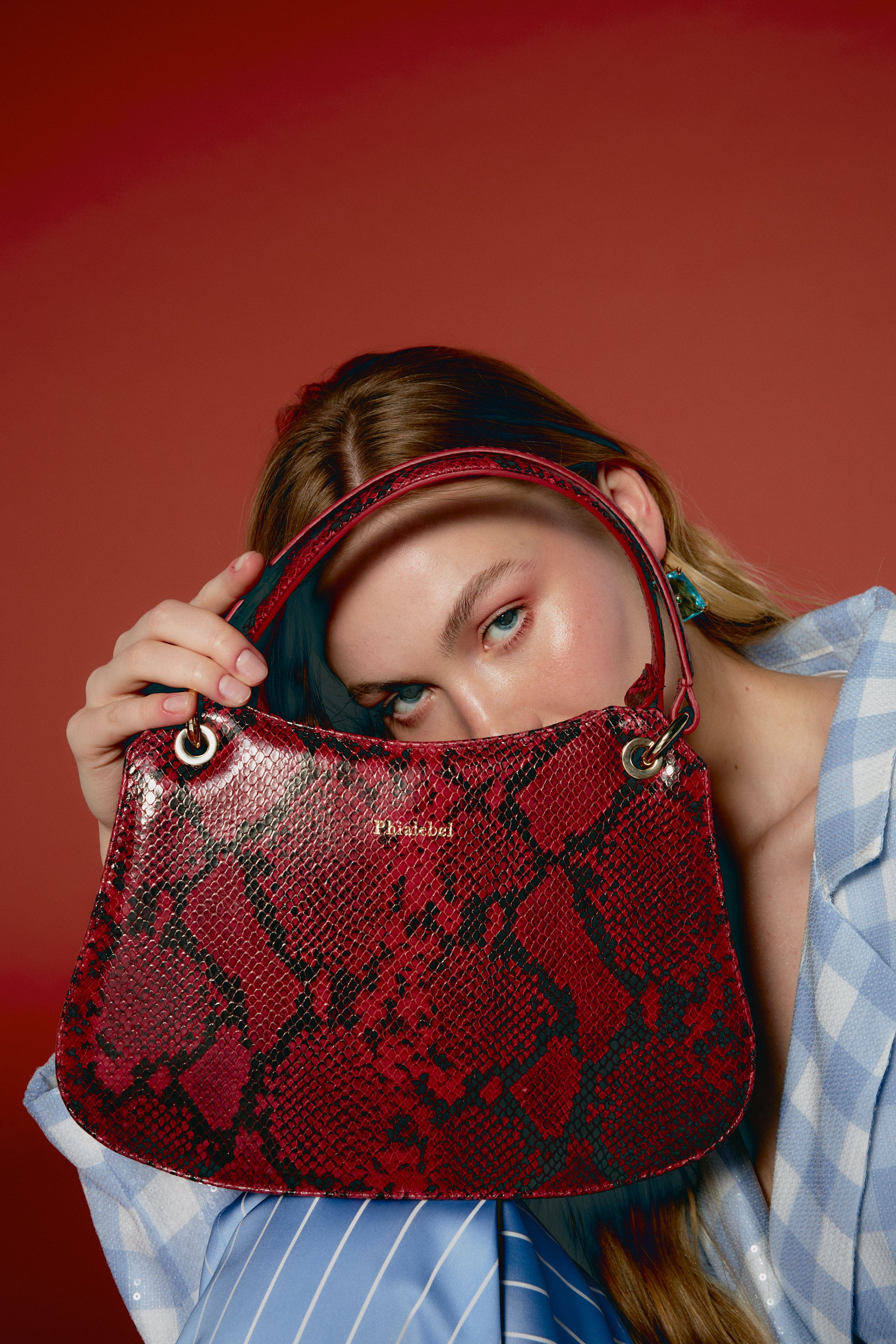 Red mini Olympia in snake print made by Phialebel