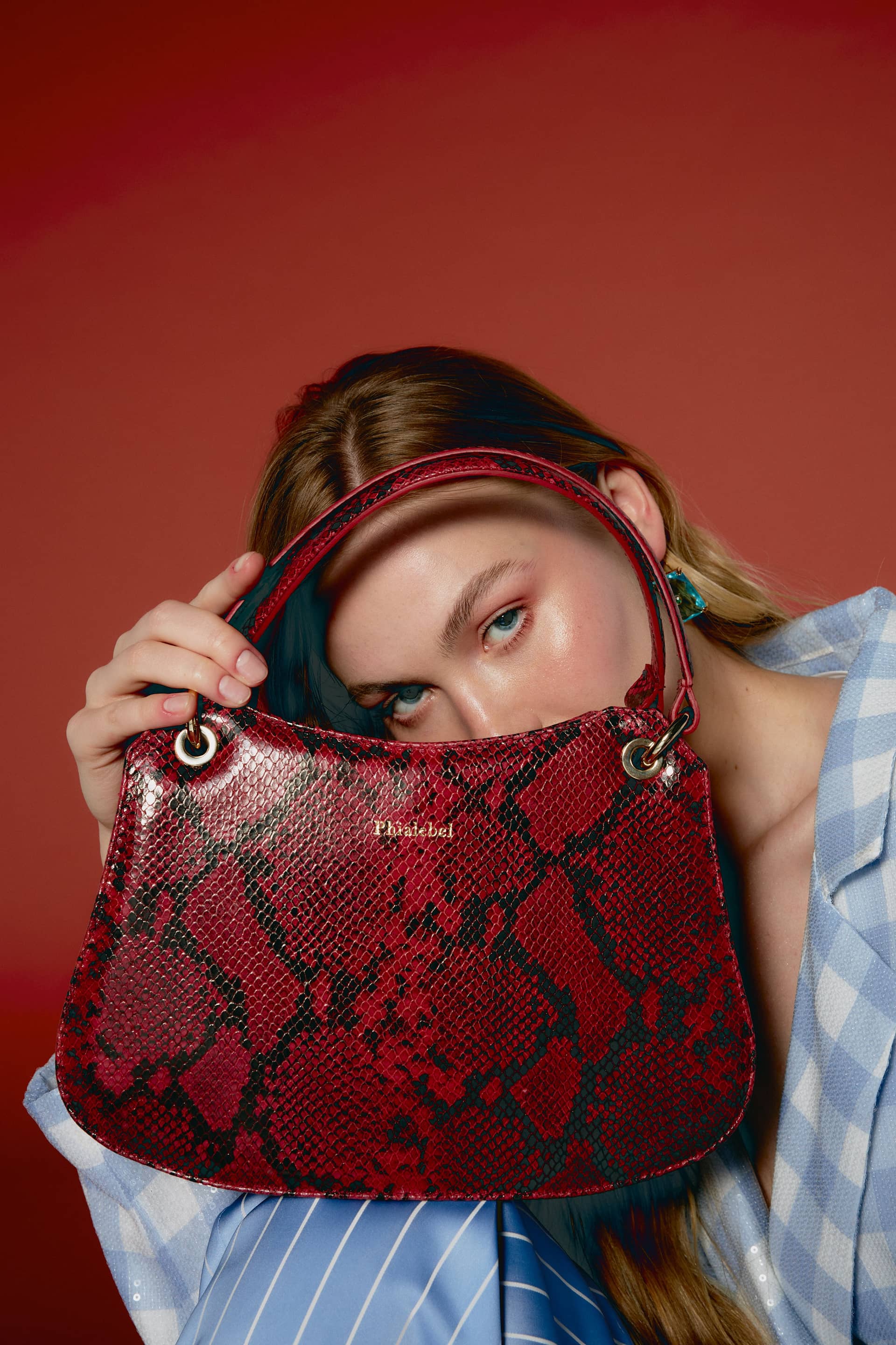 Red mini Olympia in snake print made by Phialebel