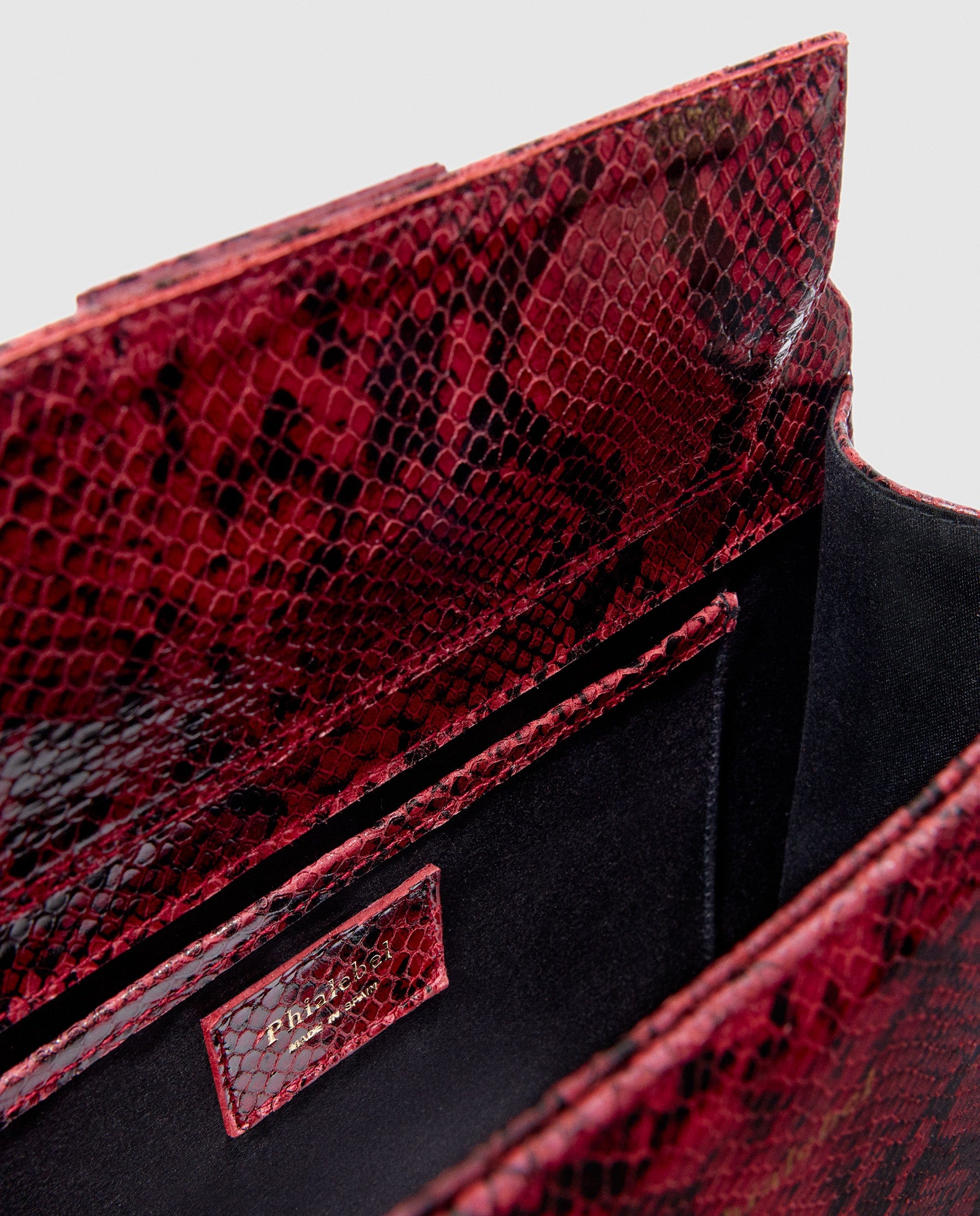 Red mini Olympia in snake print made by Phialebel