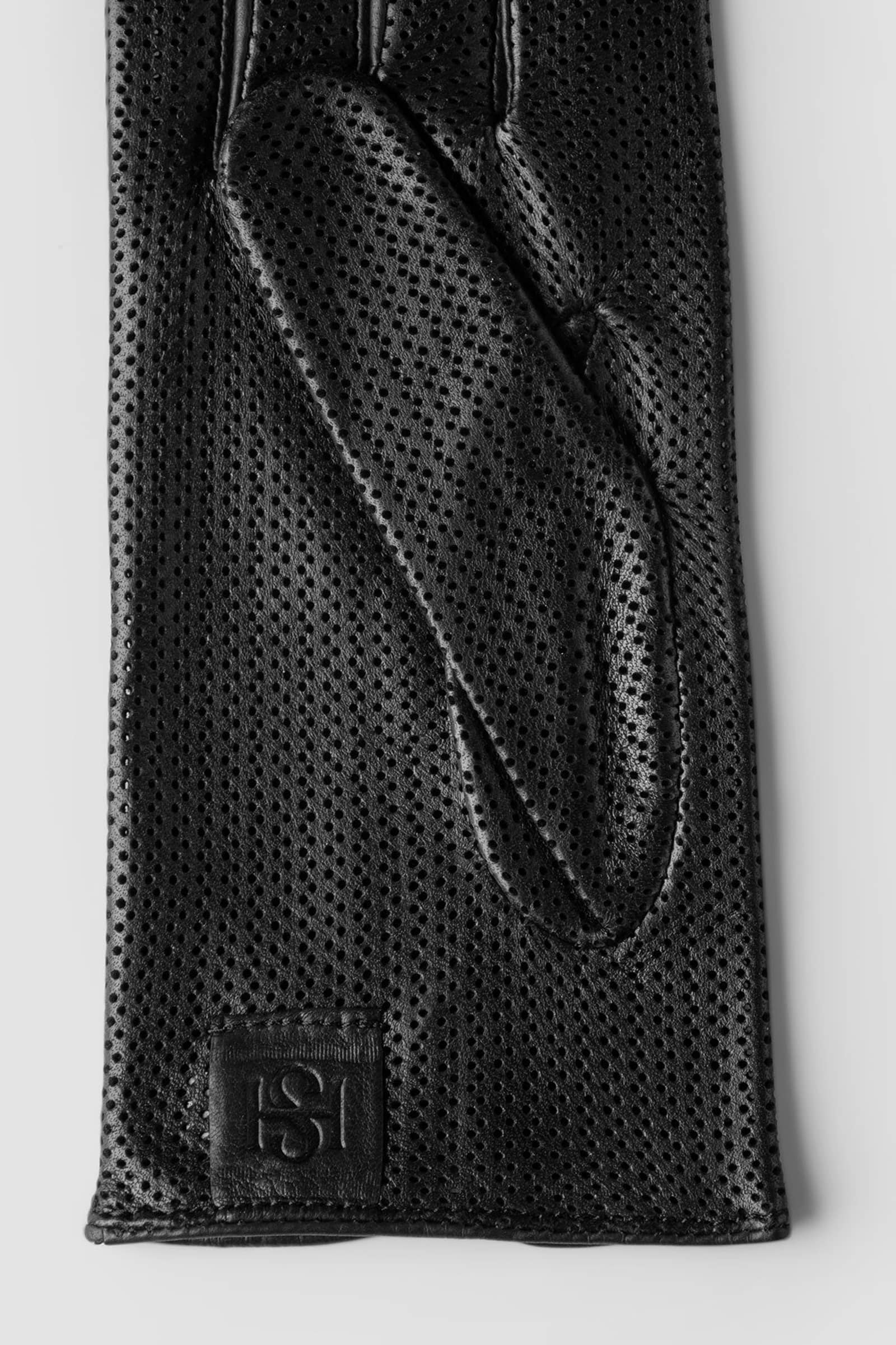 Statement Perforated Black made by Handsome Stockholm