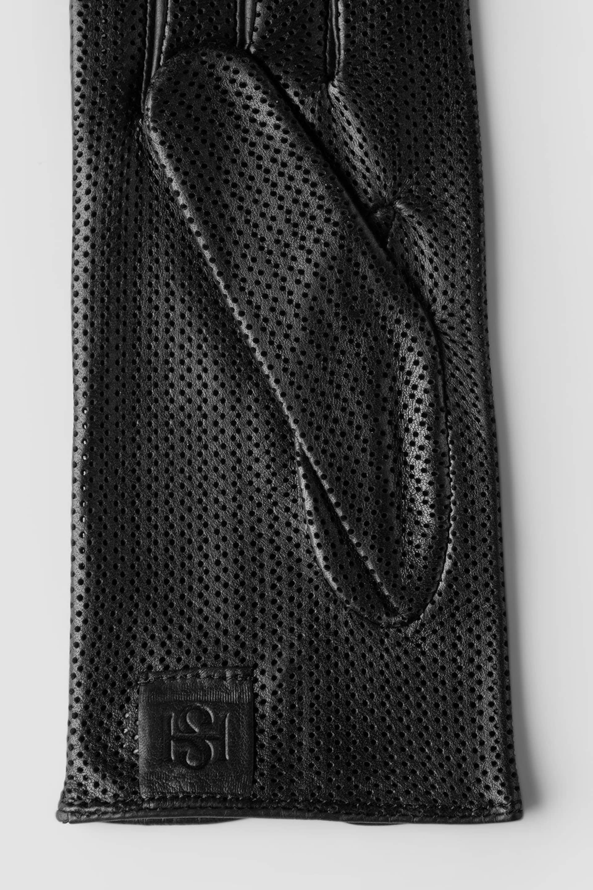 Statement Perforated Black made by Handsome Stockholm