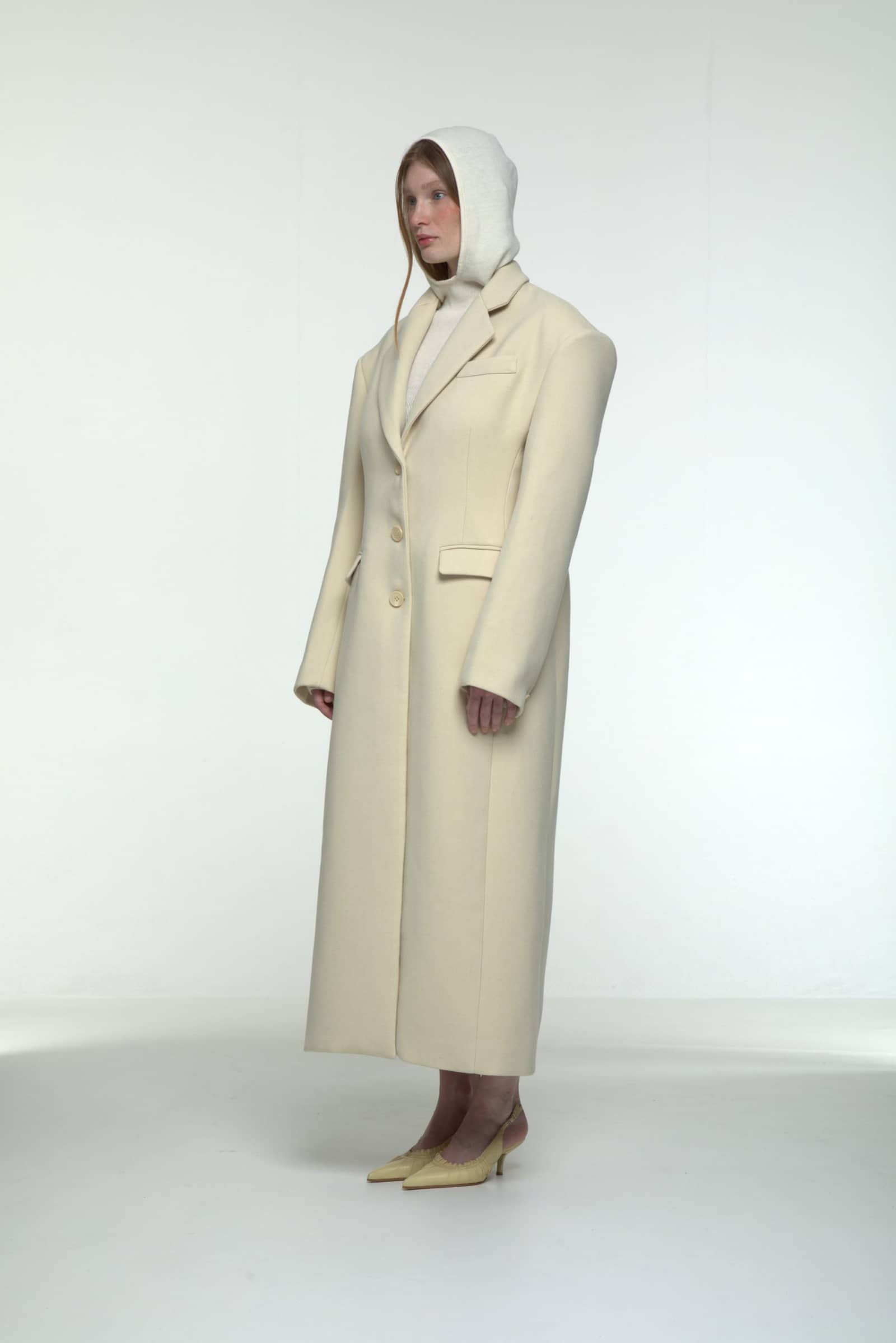 Tailored long coat made by AFTERHOURS