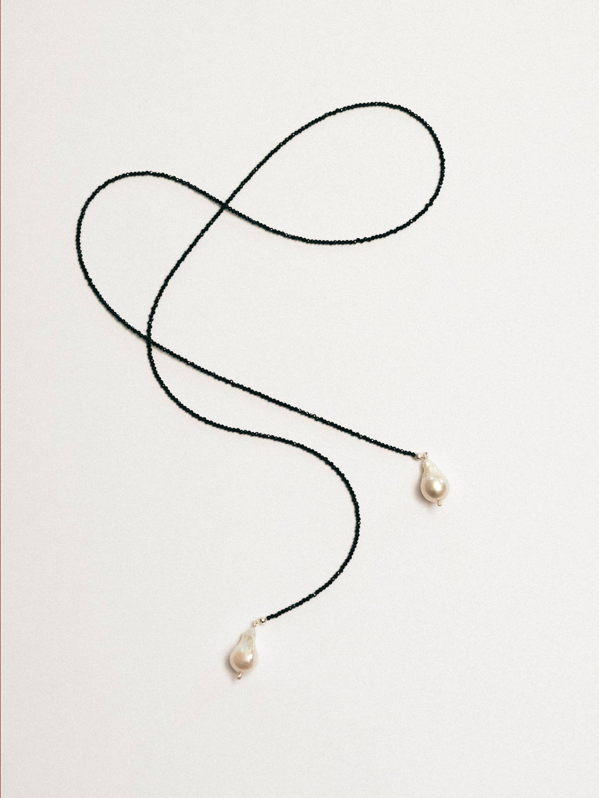 Black Swan Wrap Necklace made by Eva Remenyi