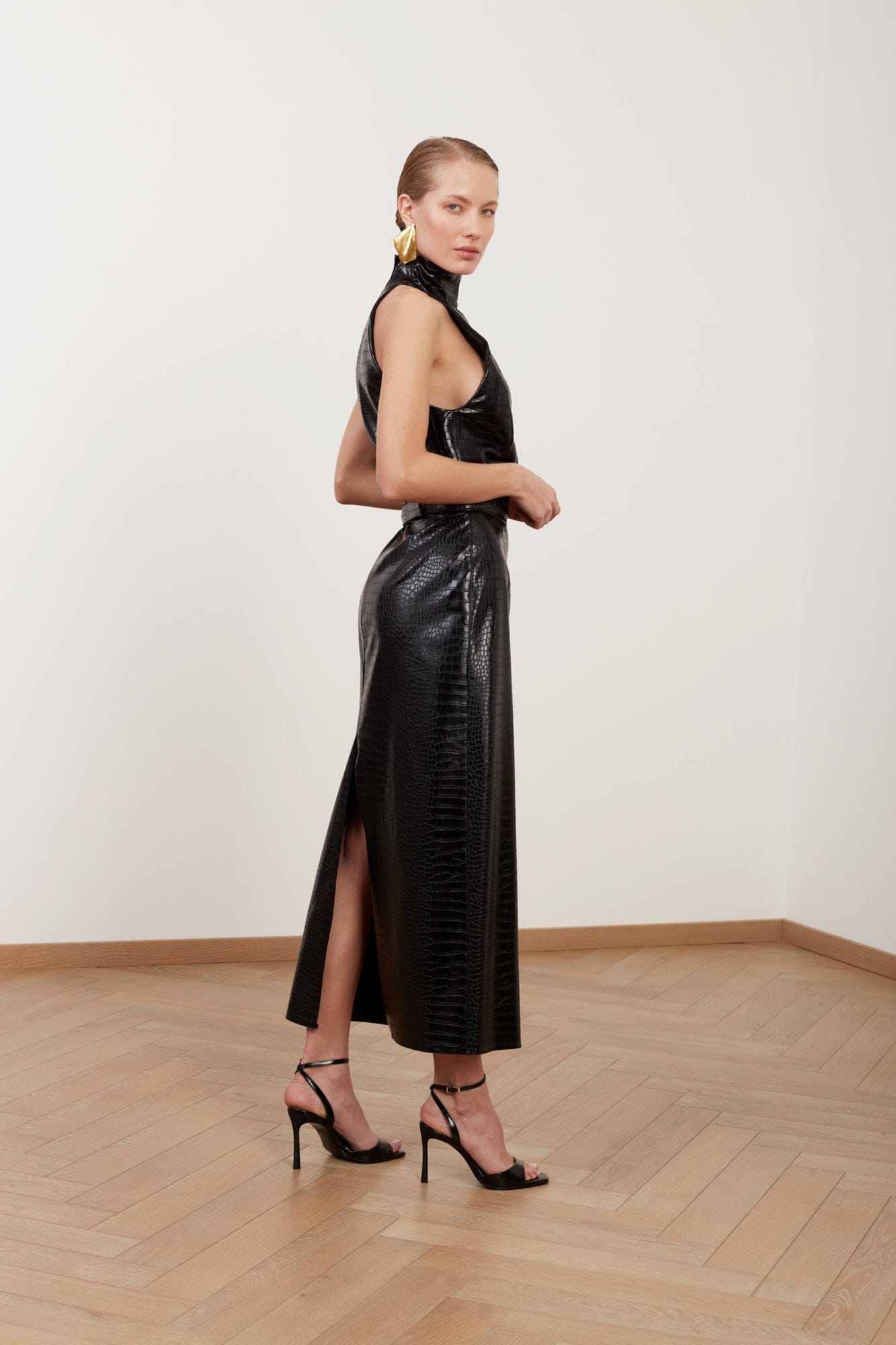 SENSA black textured vegan leather midi dress with turtleneck made by UNDRESS