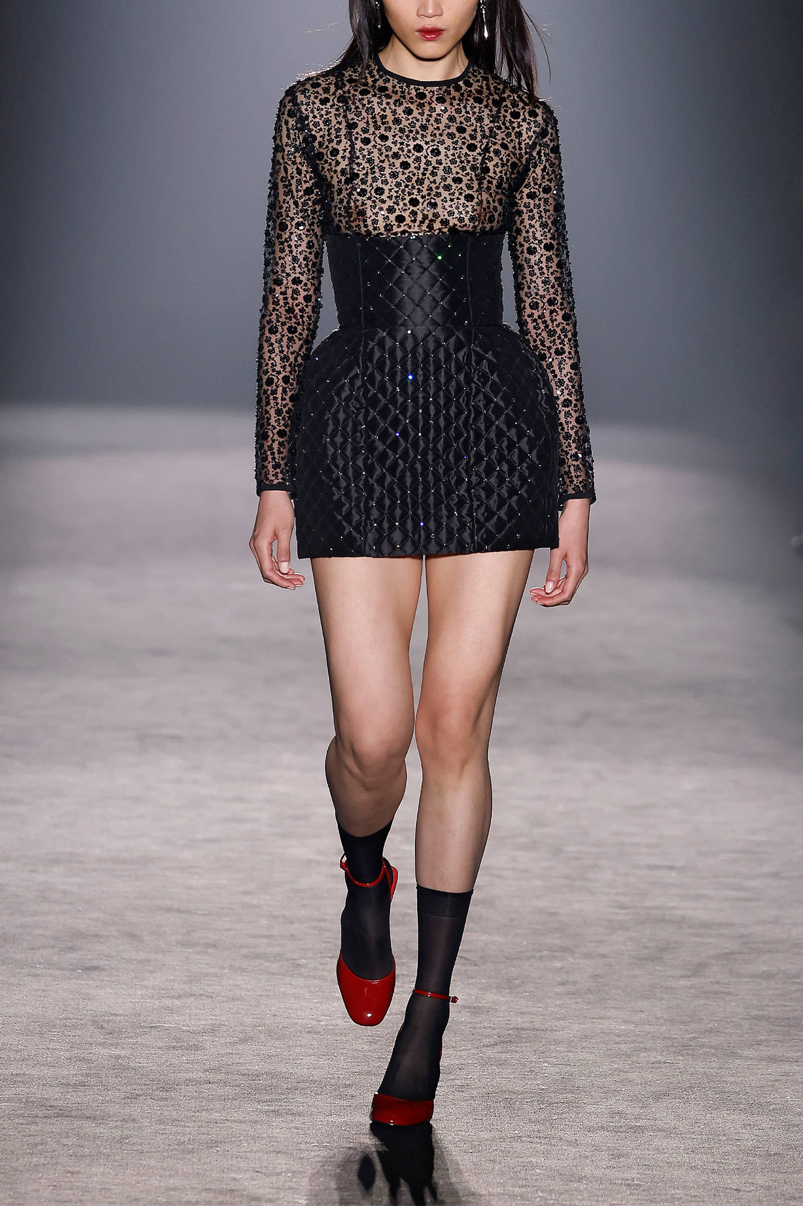 Black crystal quilted mini skirt made by Compte Spain