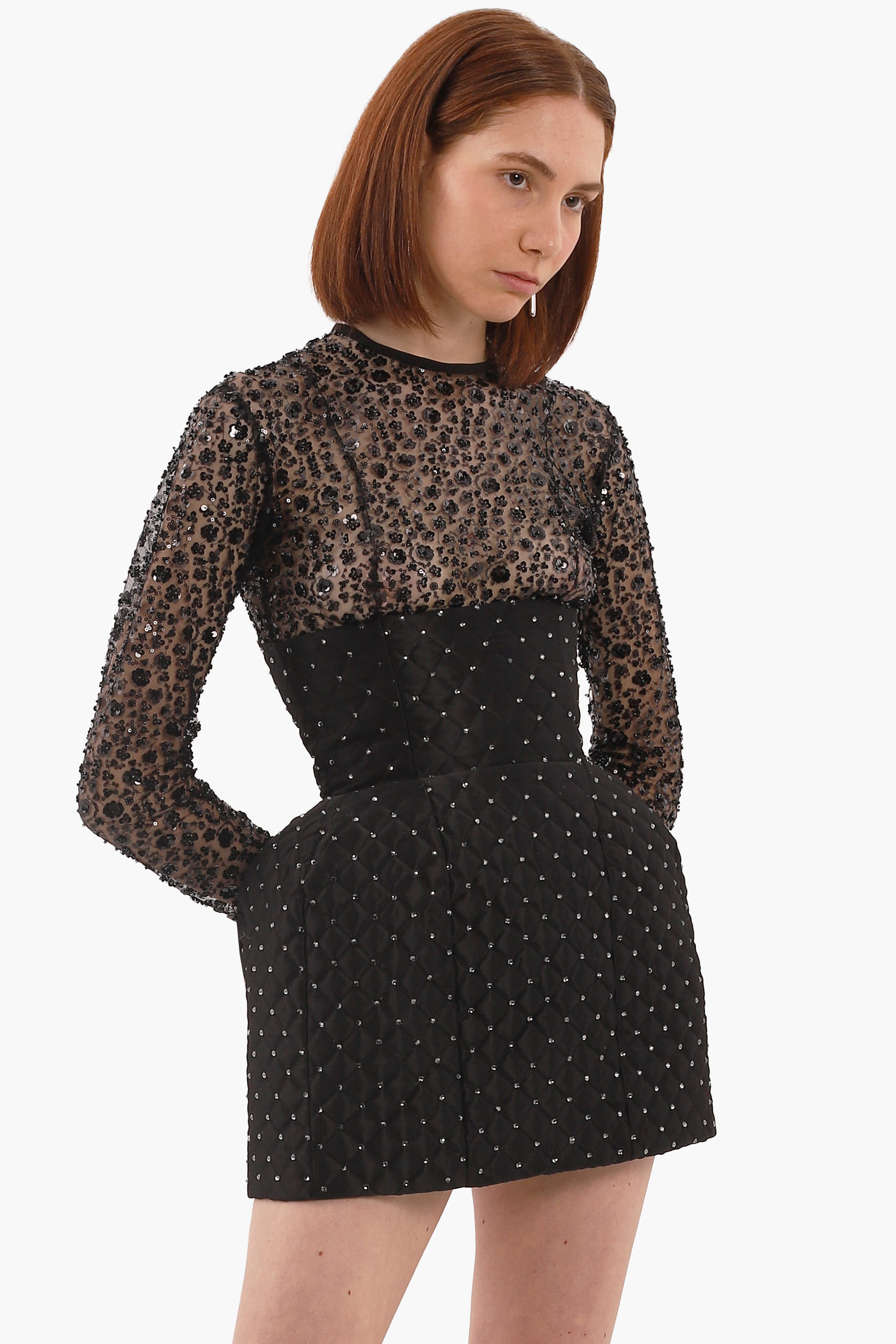 Black crystal quilted mini skirt made by Compte Spain