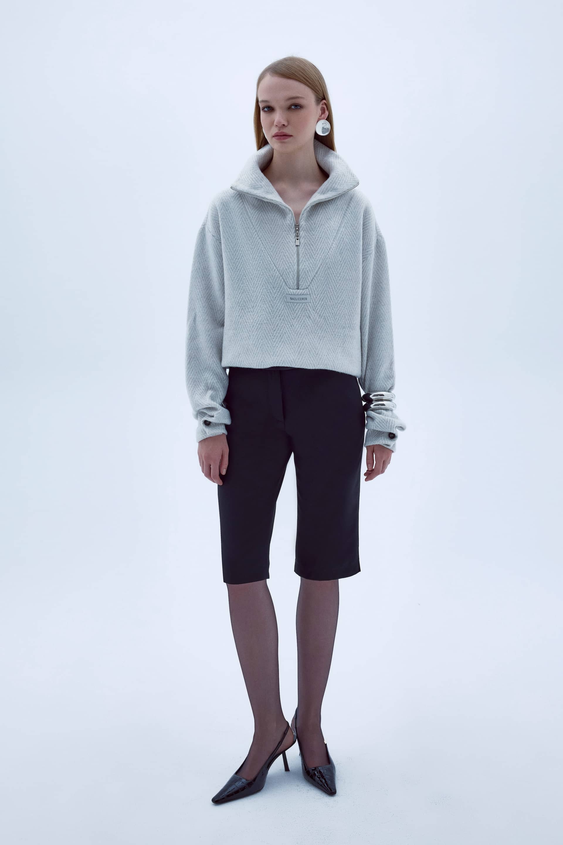 ARCED CAPRI TROUSERS made by Nazli Ceren