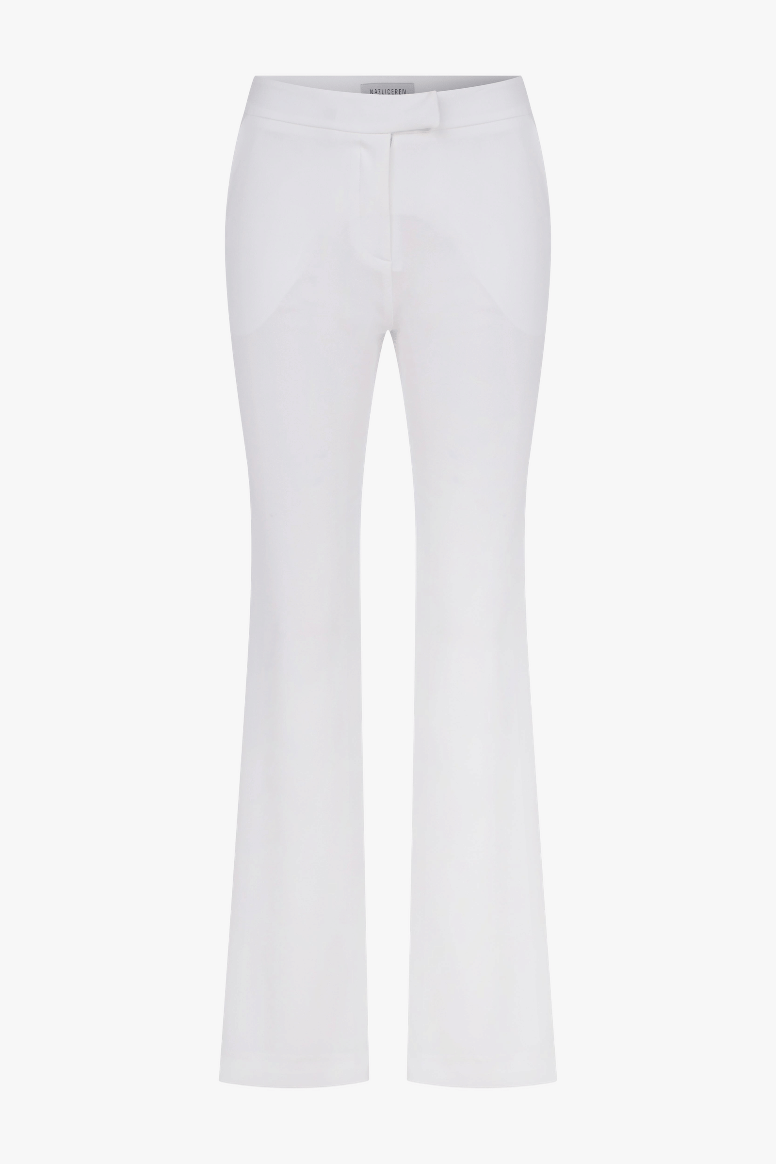 Arced Crepe Trousers In Blanche made by Nazli Ceren
