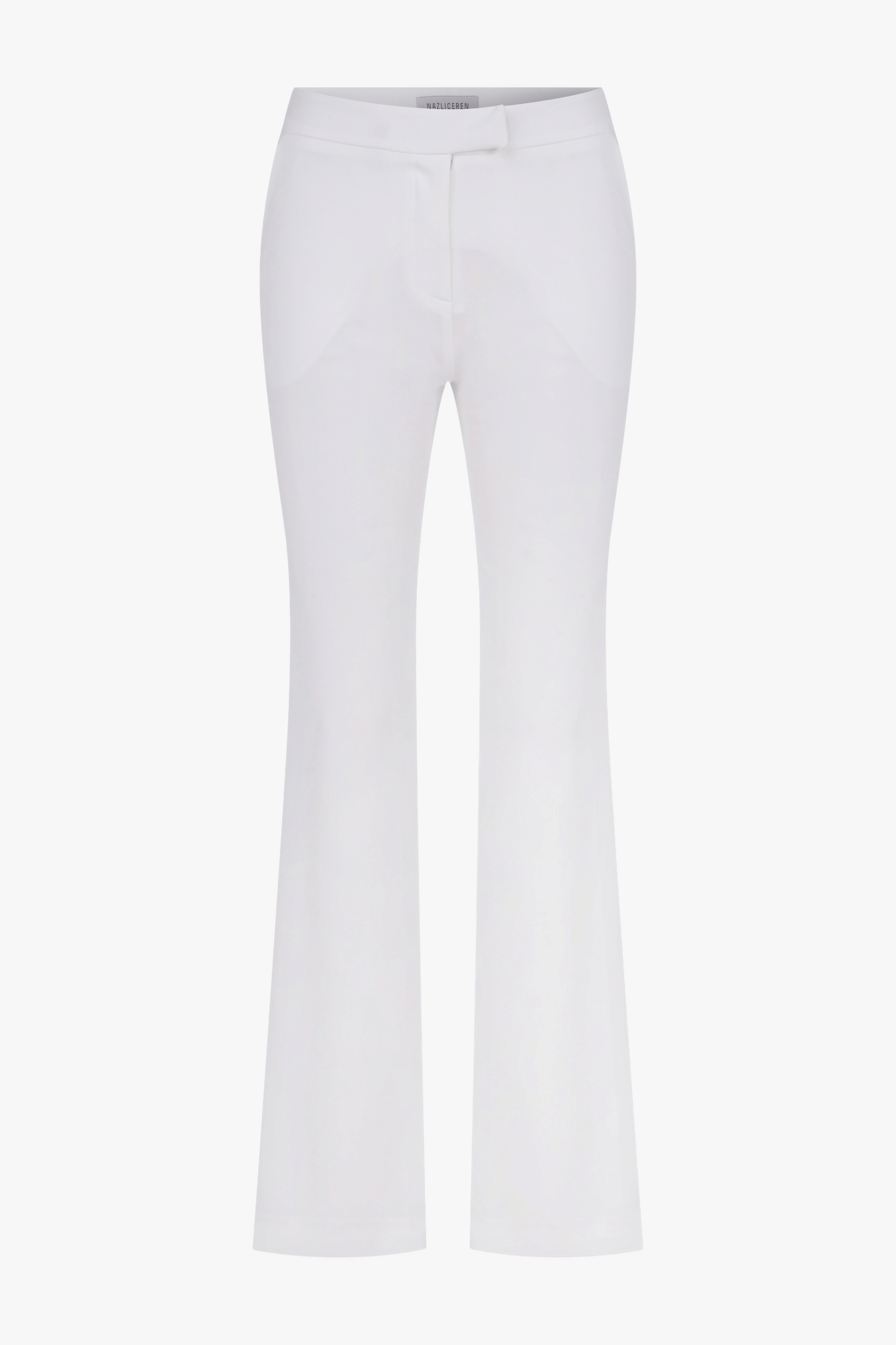 Arced Crepe Trousers In Blanche made by Nazli Ceren