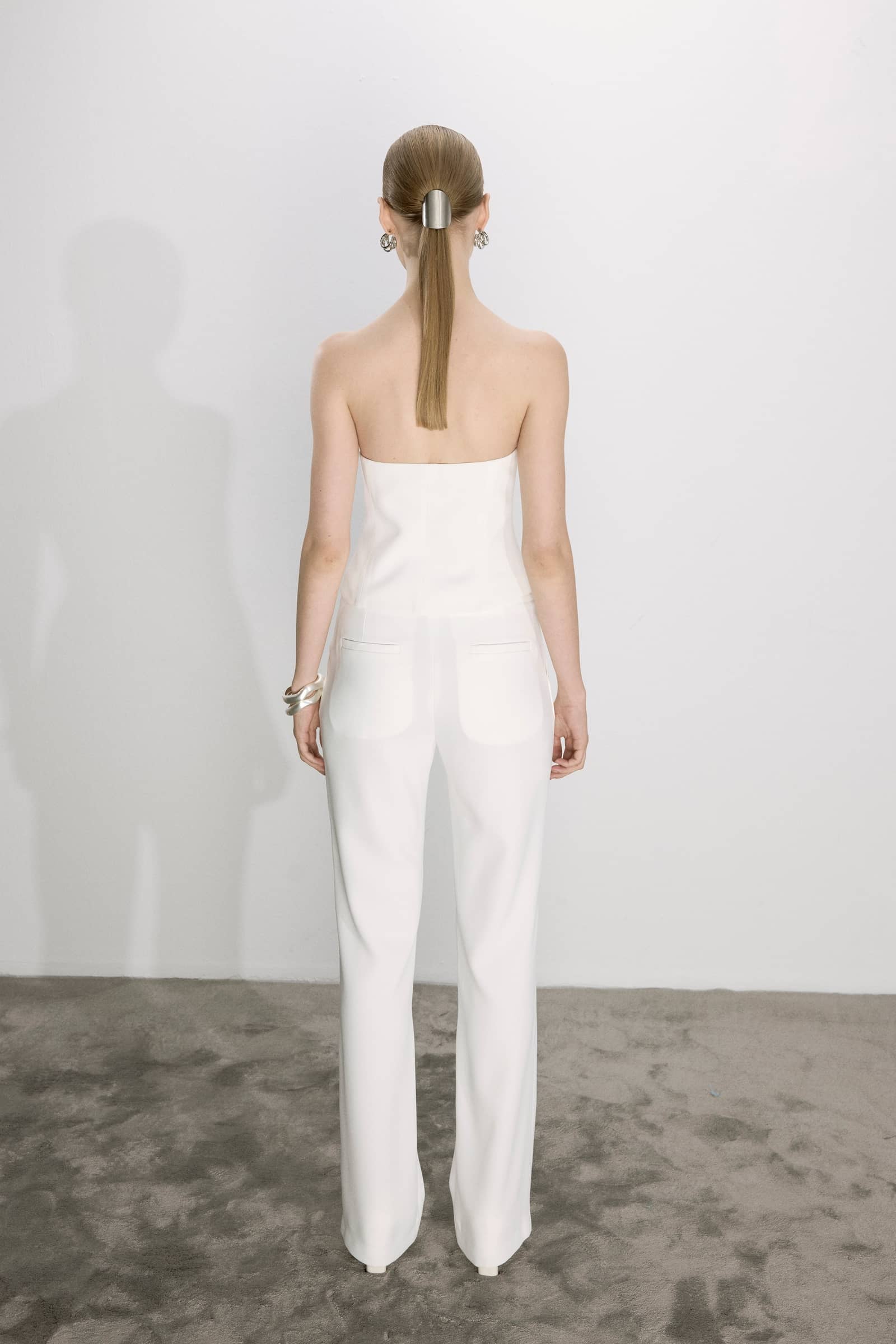 Arced Crepe Trousers In Blanche made by Nazli Ceren