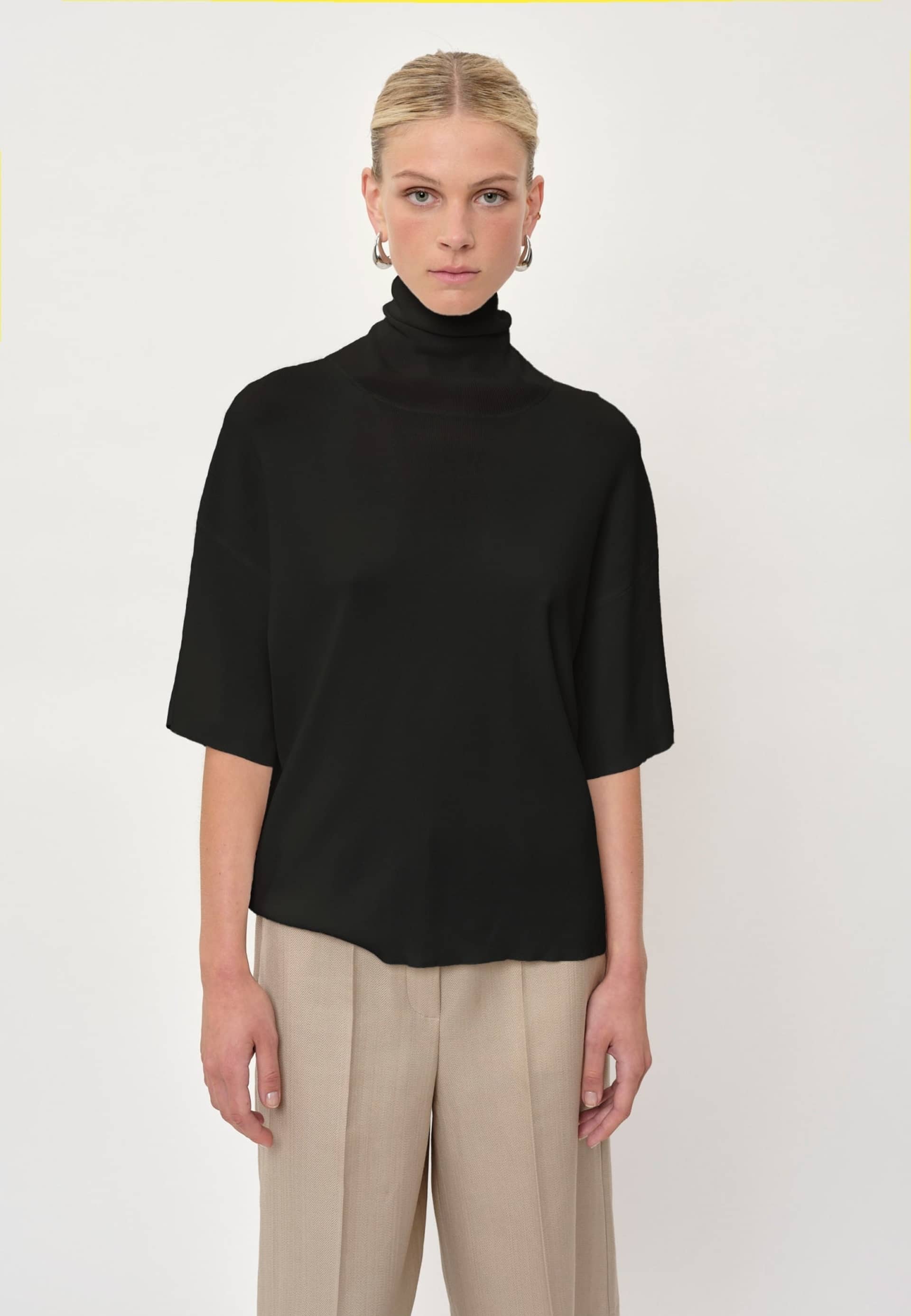 Brittany Knit T-shirt - Black made by HERSKIND