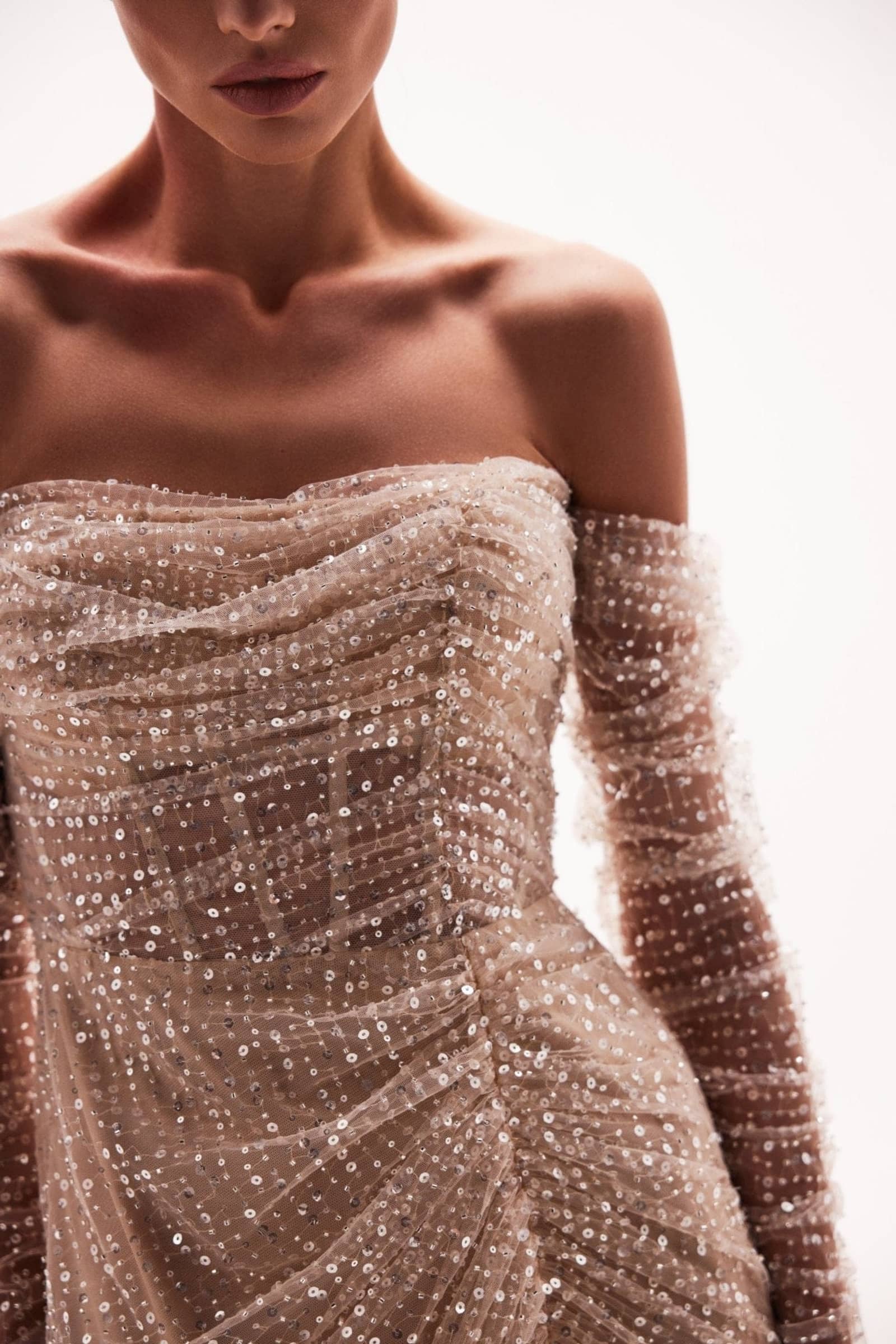 Spectacular sequined maxi dress in gold made by Milla