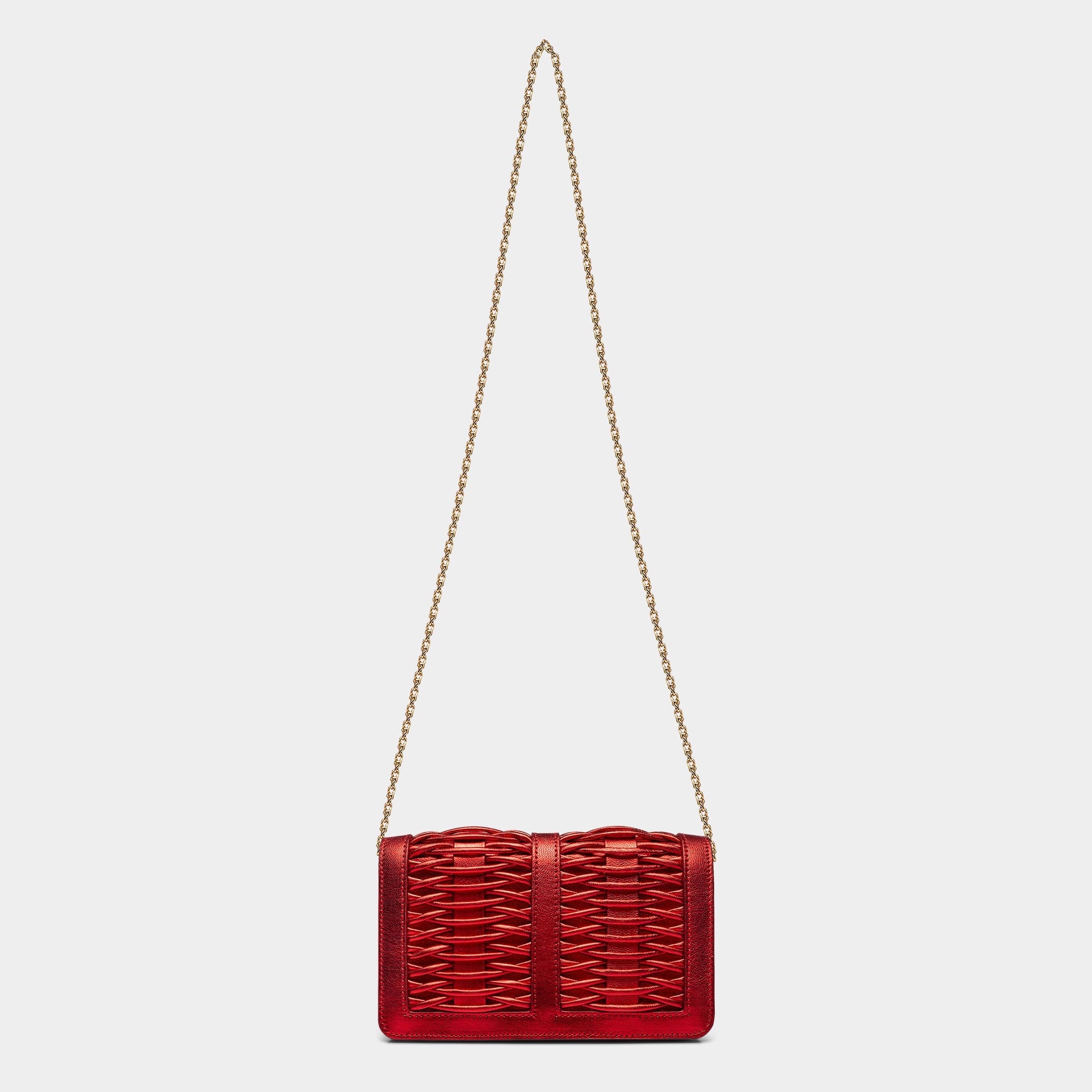 Lea red metallic braided clutch made by Yliana Yepez