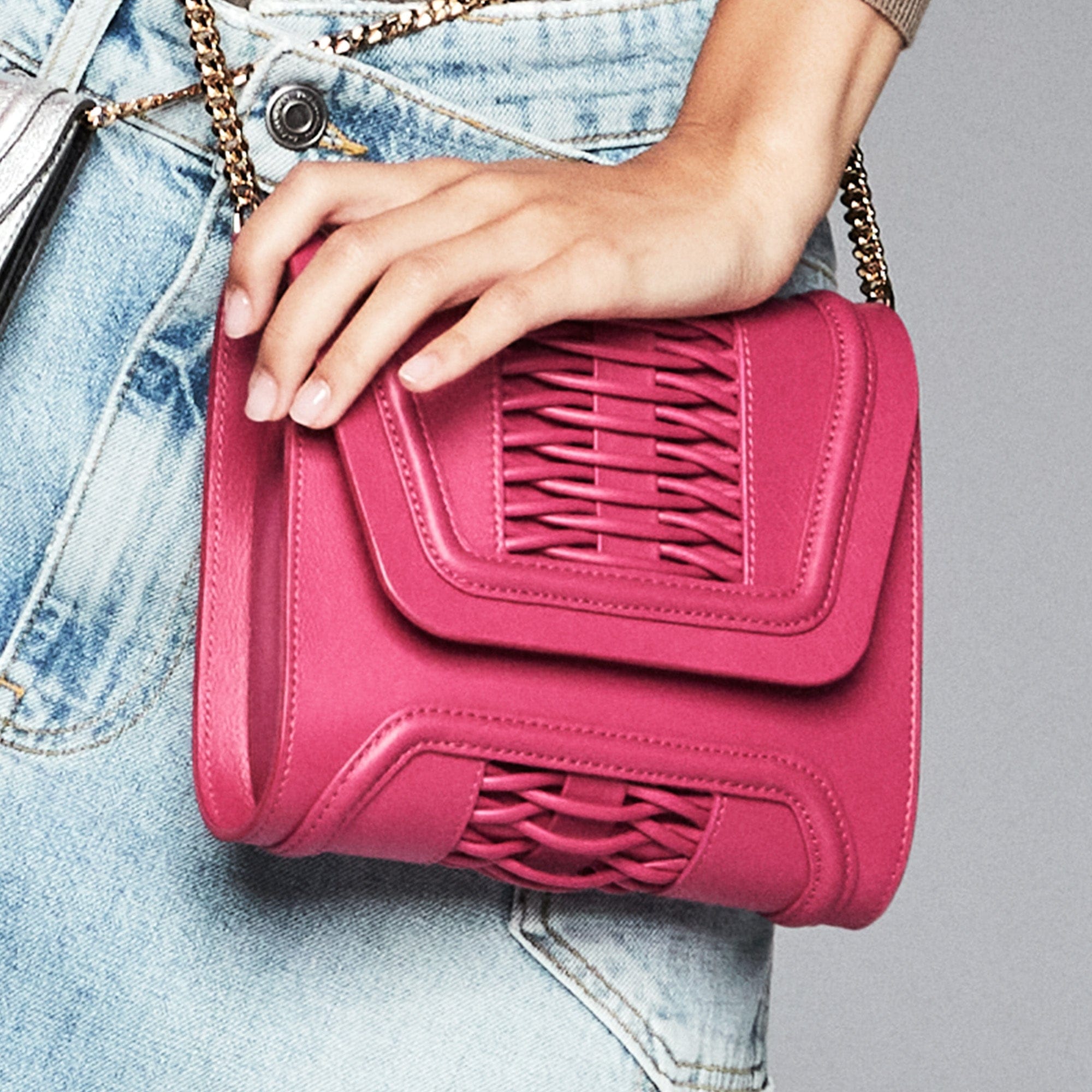 Mini Giovanna fuchsia braided clutch made by Yliana Yepez