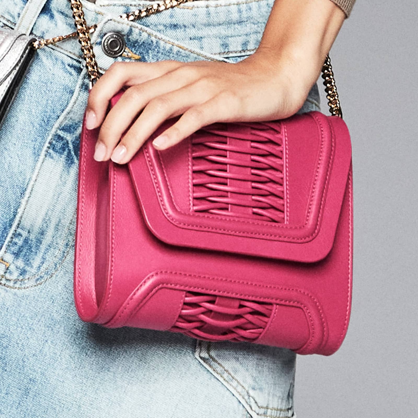 Mini Giovanna fuchsia braided clutch made by Yliana Yepez