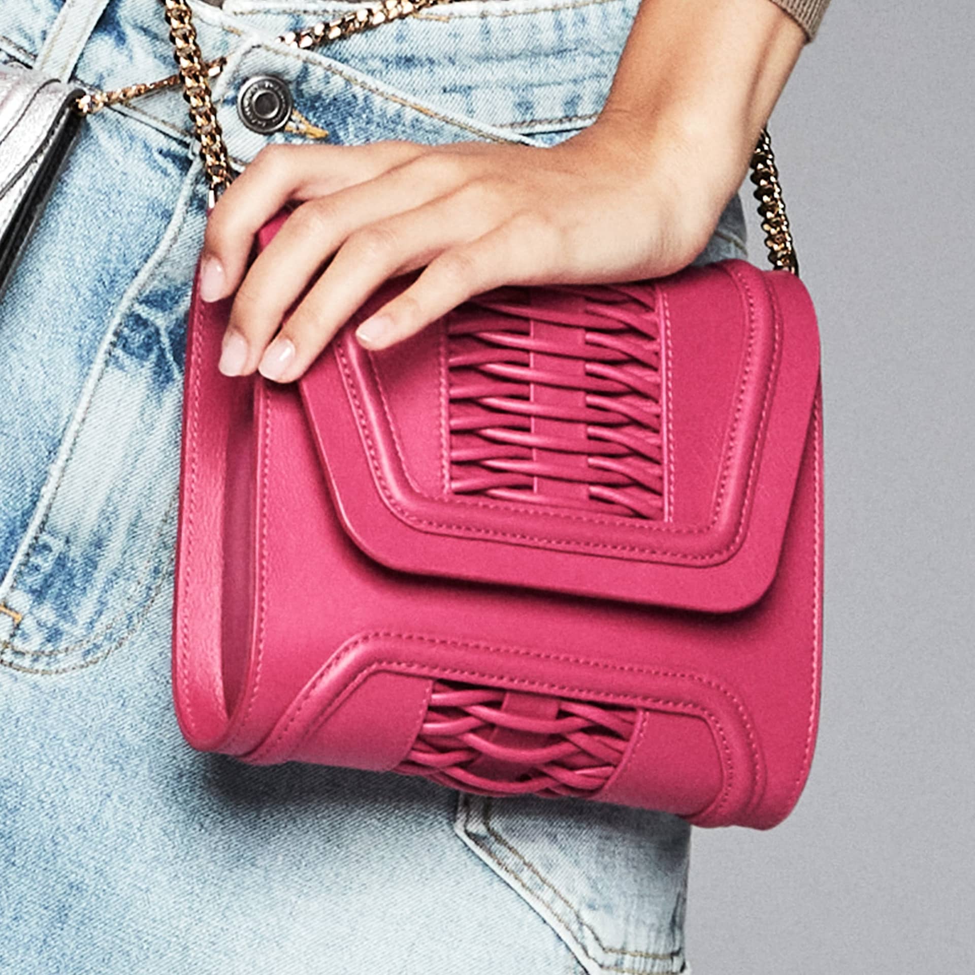 Mini Giovanna fuchsia braided clutch made by Yliana Yepez