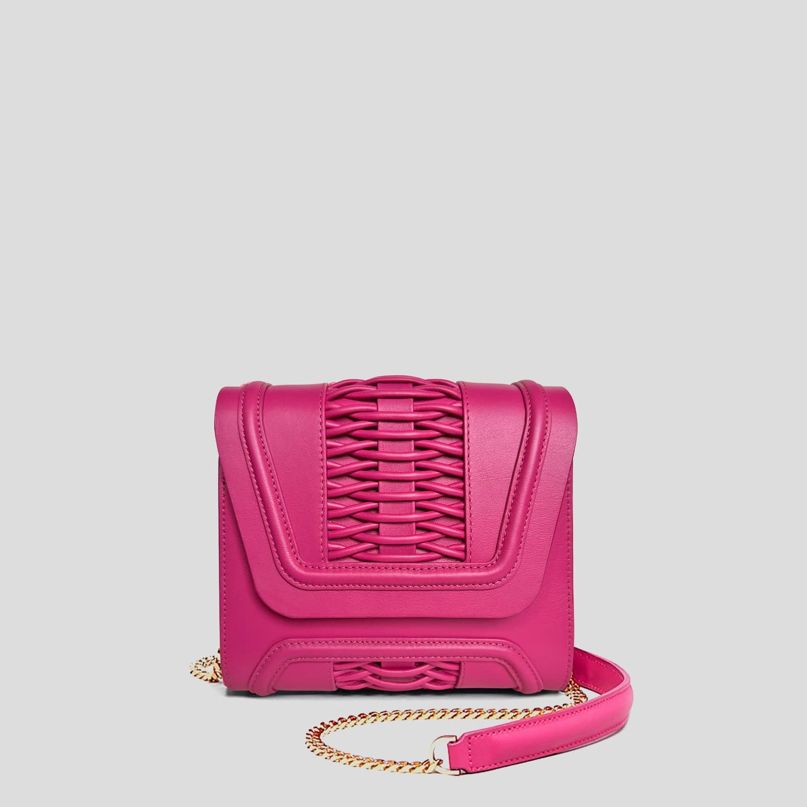 Mini Giovanna fuchsia braided clutch made by Yliana Yepez