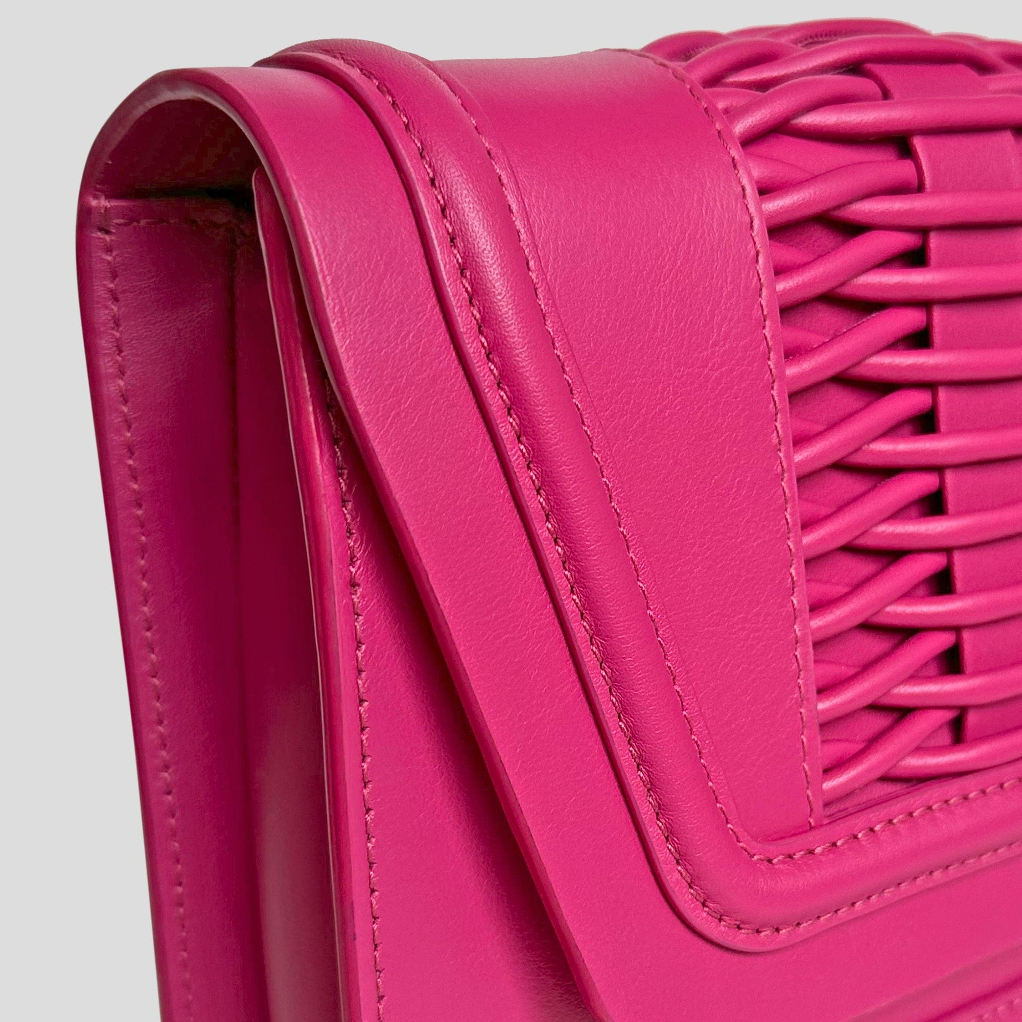 Mini Giovanna fuchsia braided clutch made by Yliana Yepez