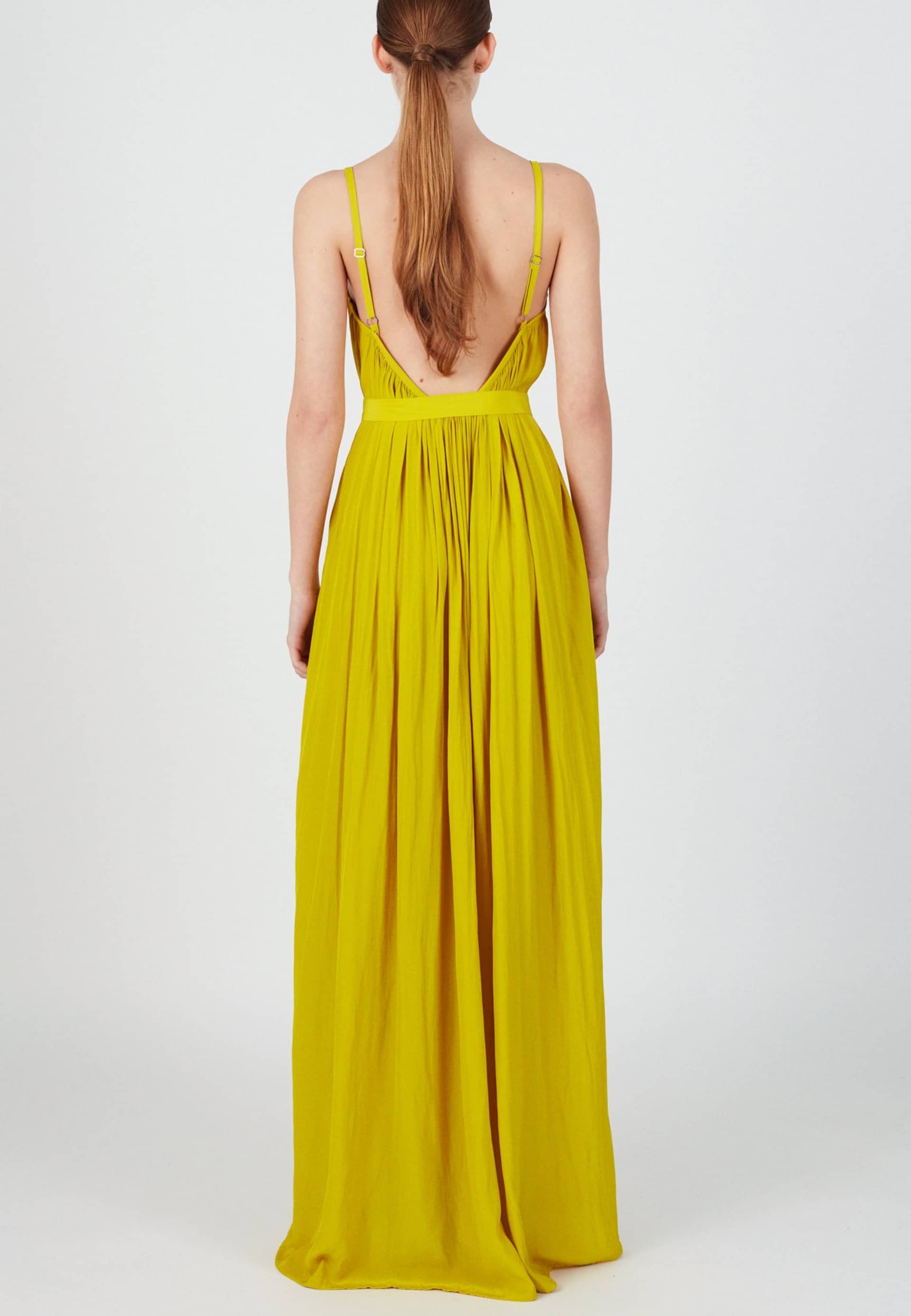 MEFYA long flowing lime yellow dress in Yellow made by UNDRESS