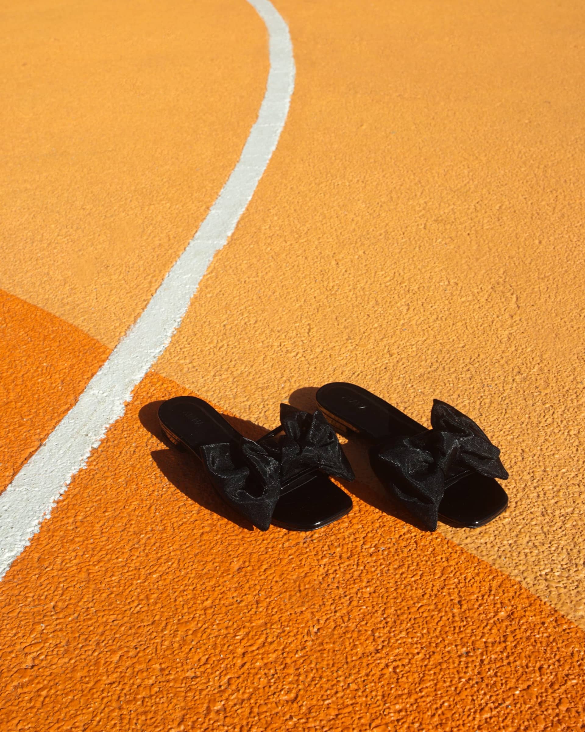 Bow Slide Black Patent in Black made by ATANA