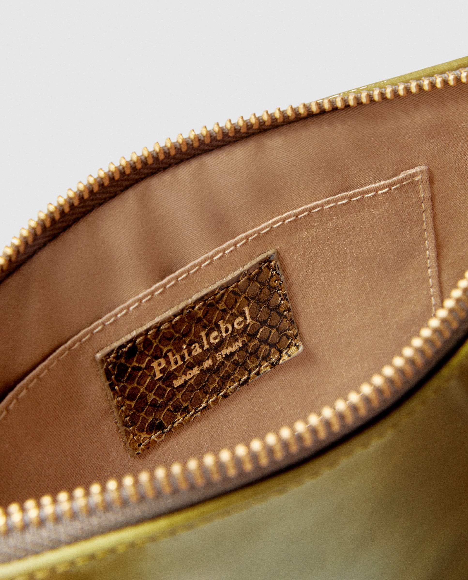 Green patent leather mini wallet made by Phialebel