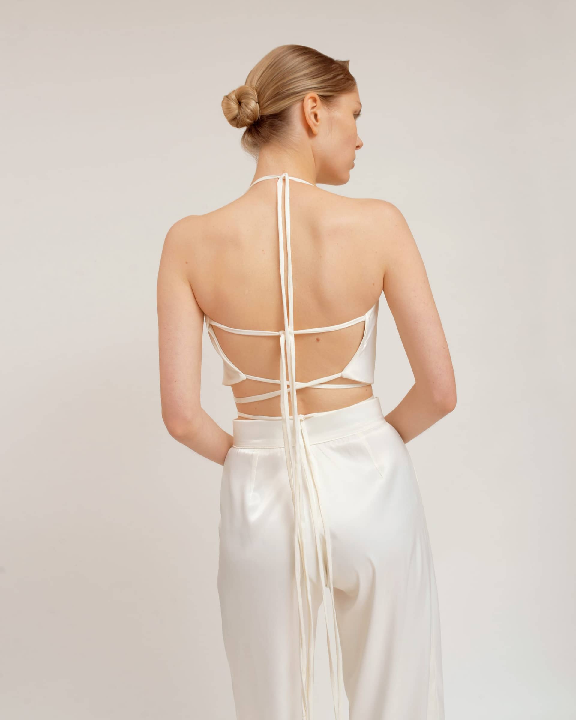 Trousers in White made by Camila Sarmiento