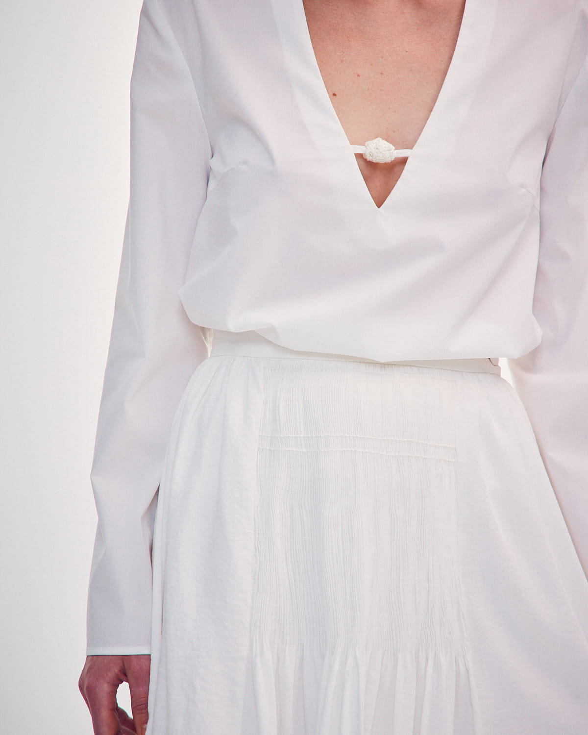 SHIRT WITH A KNITTED BUTTON made by DELEGAN Clothes