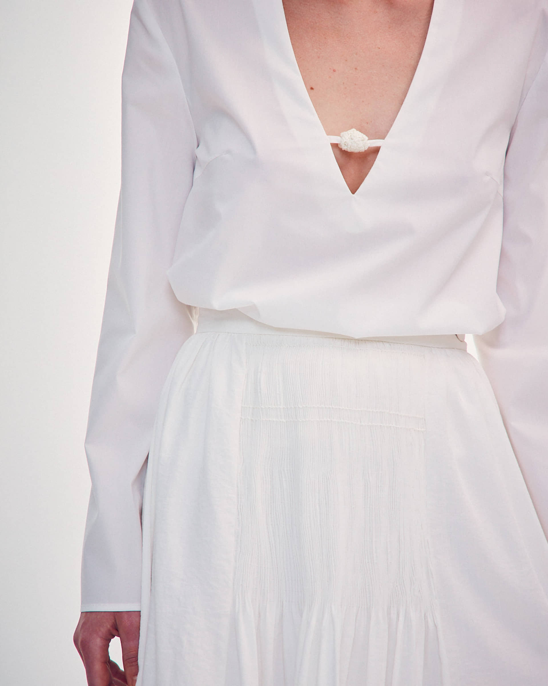 SHIRT WITH A KNITTED BUTTON made by DELEGAN Clothes