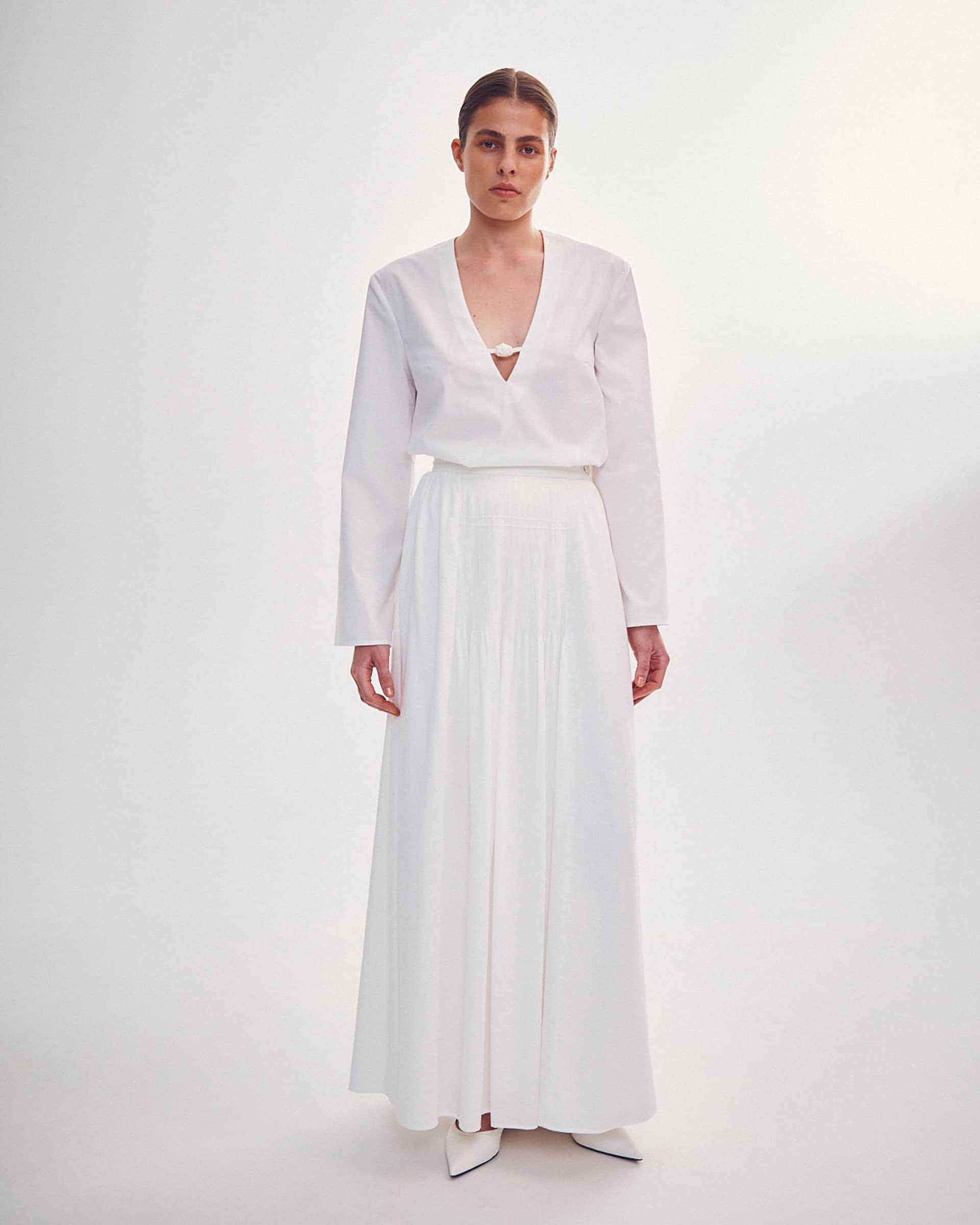 SHIRT WITH A KNITTED BUTTON made by DELEGAN Clothes