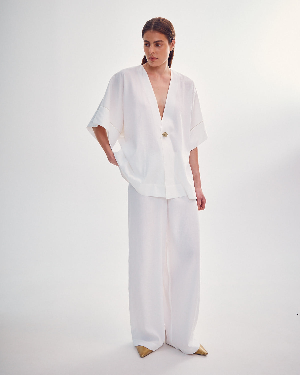 SHIRT WITH A KNITTED GOLD BUTTON made by DELEGAN Clothes