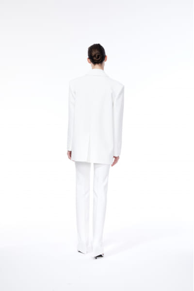 TAILORED SLIM TROUSERS made by NUÉ