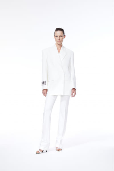 TAILORED SLIM TROUSERS made by NUÉ