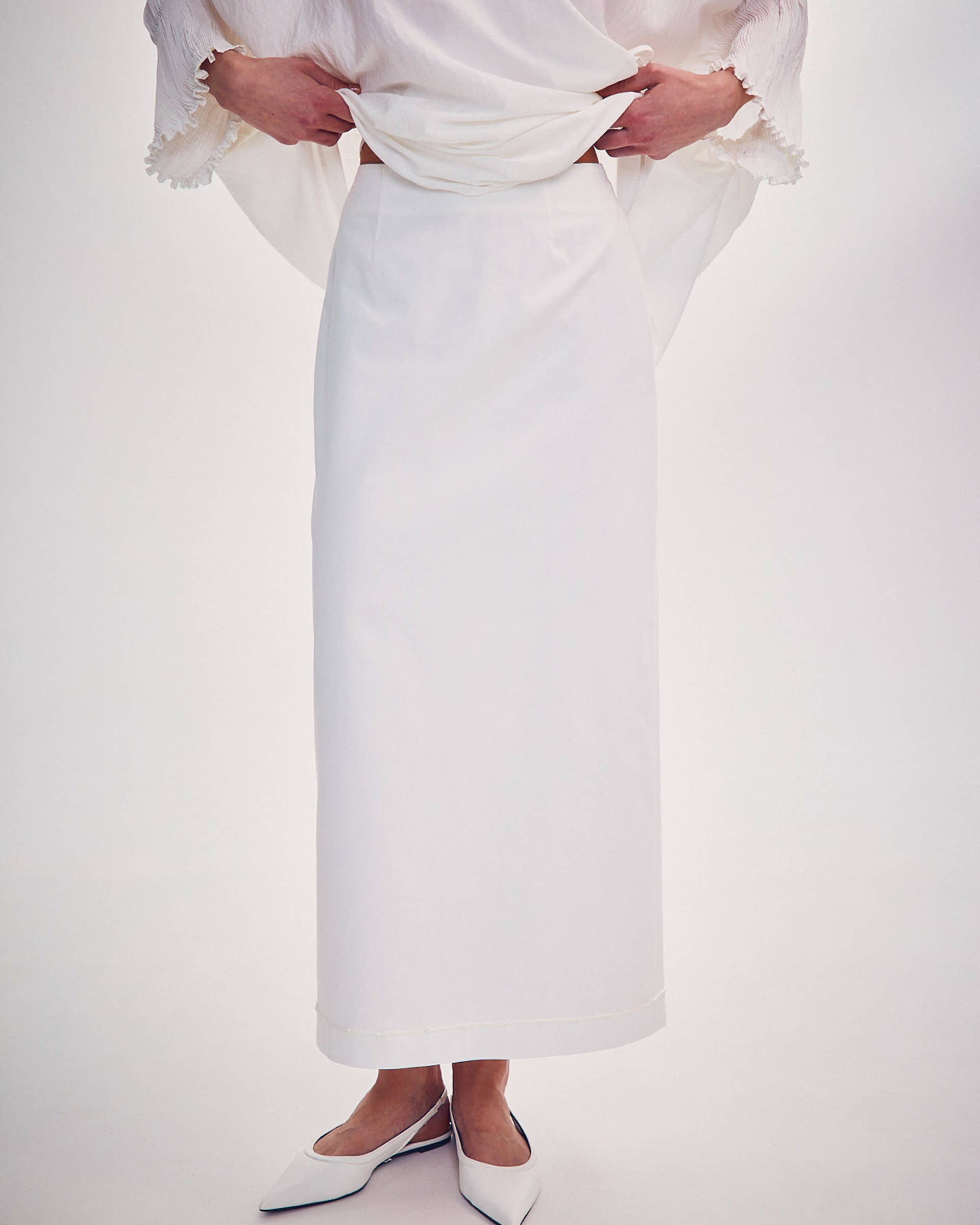 SKIRT WITH KNITTED ORNAMENT made by DELEGAN Clothes